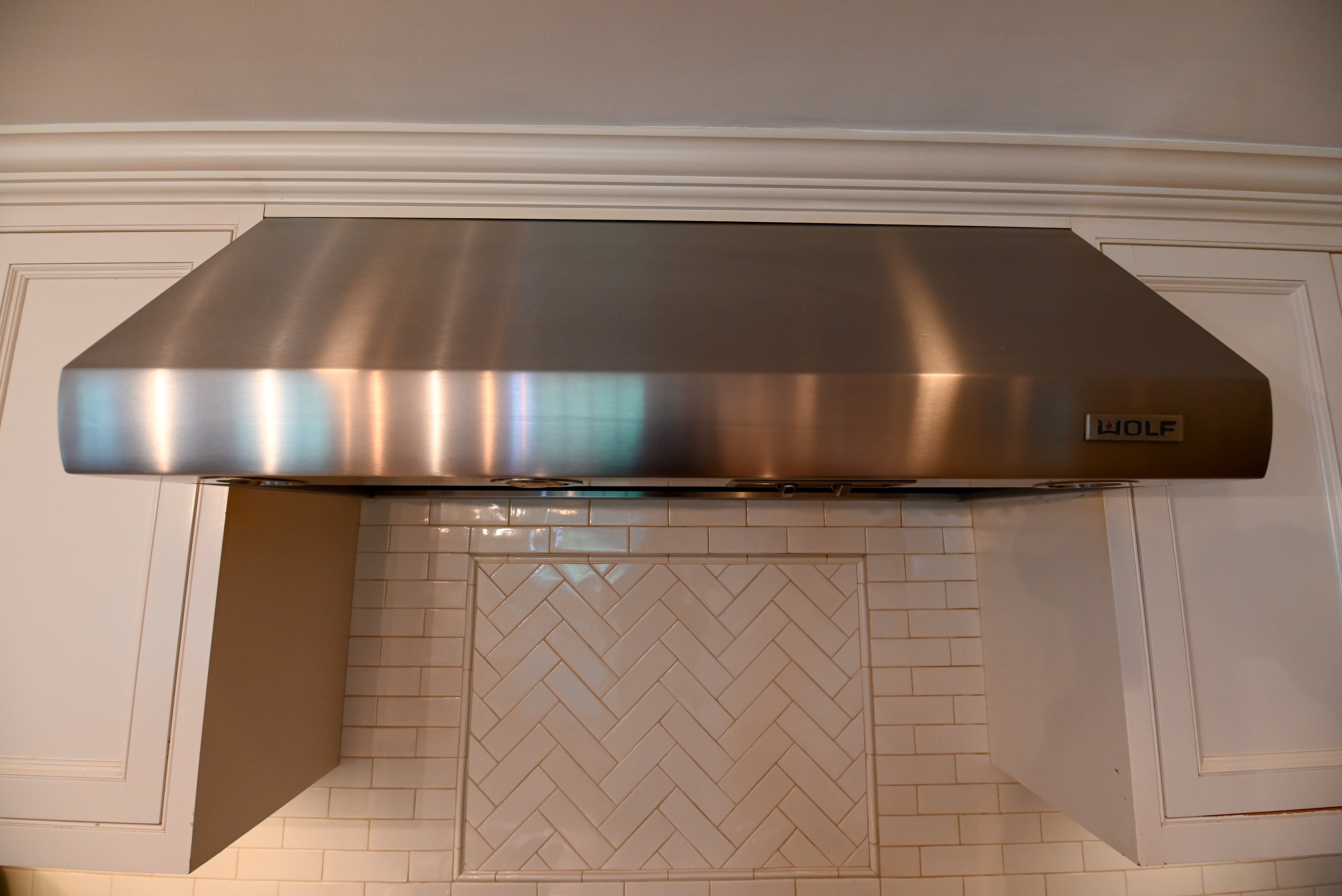 "The Montclair" Transitional White Kitchen with Island & Wolf 48" Range