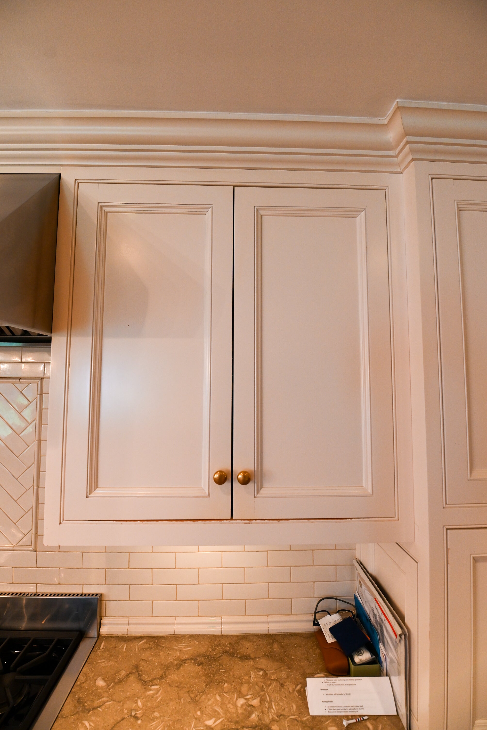 "The Montclair" Transitional White Kitchen with Island & Wolf 48" Range