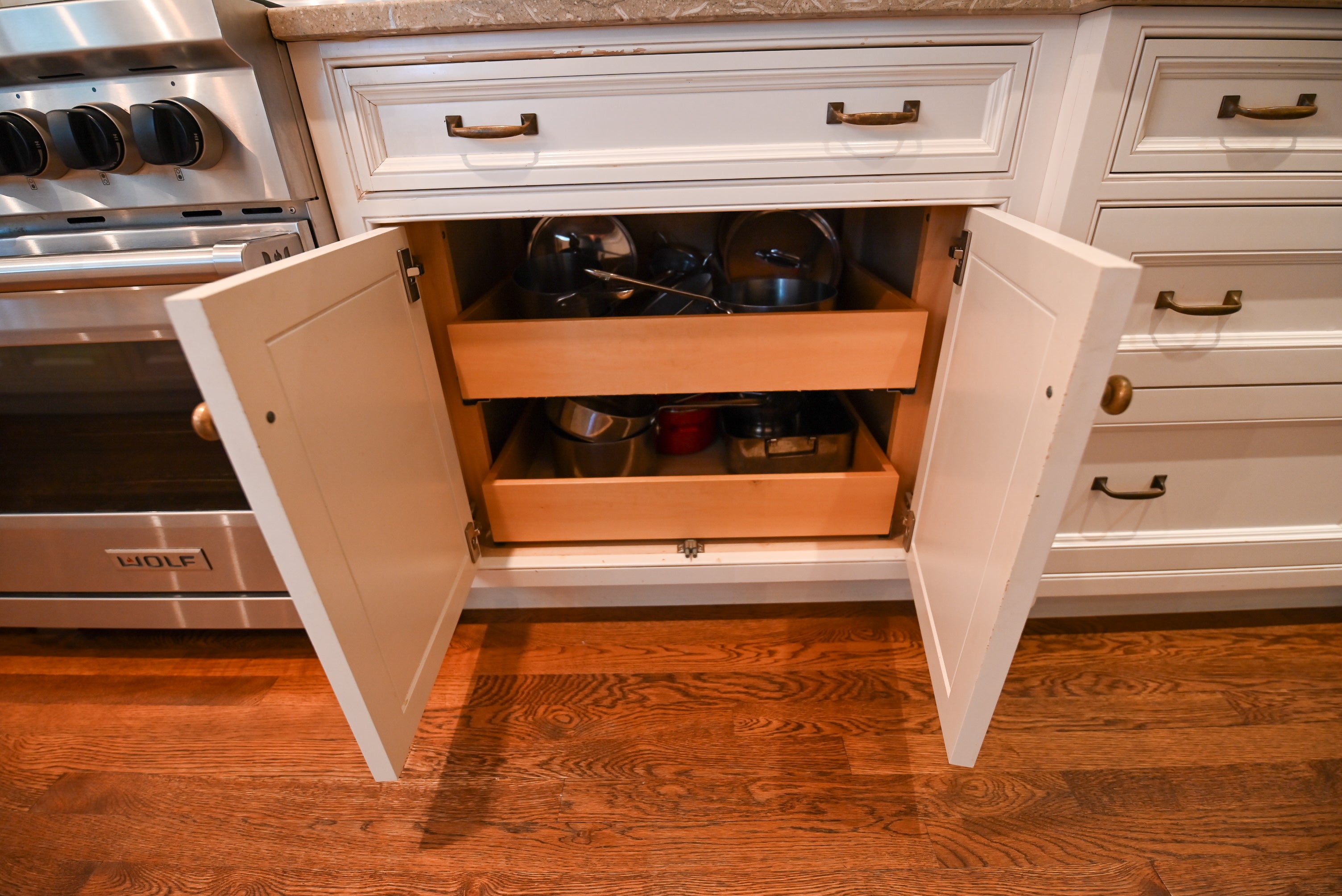 "The Montclair" Transitional White Kitchen with Island & Wolf 48" Range