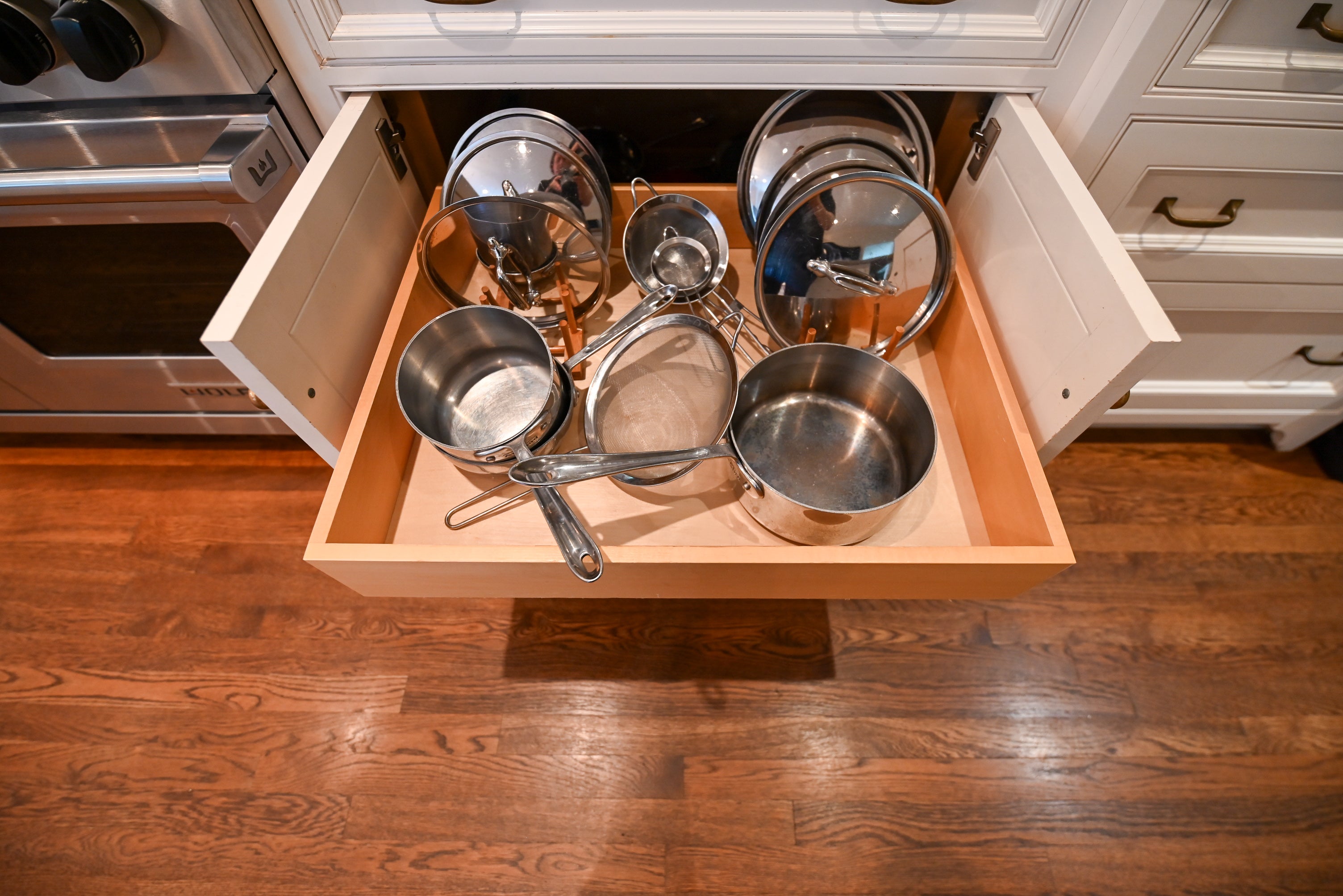 "The Montclair" Transitional White Kitchen with Island & Wolf 48" Range