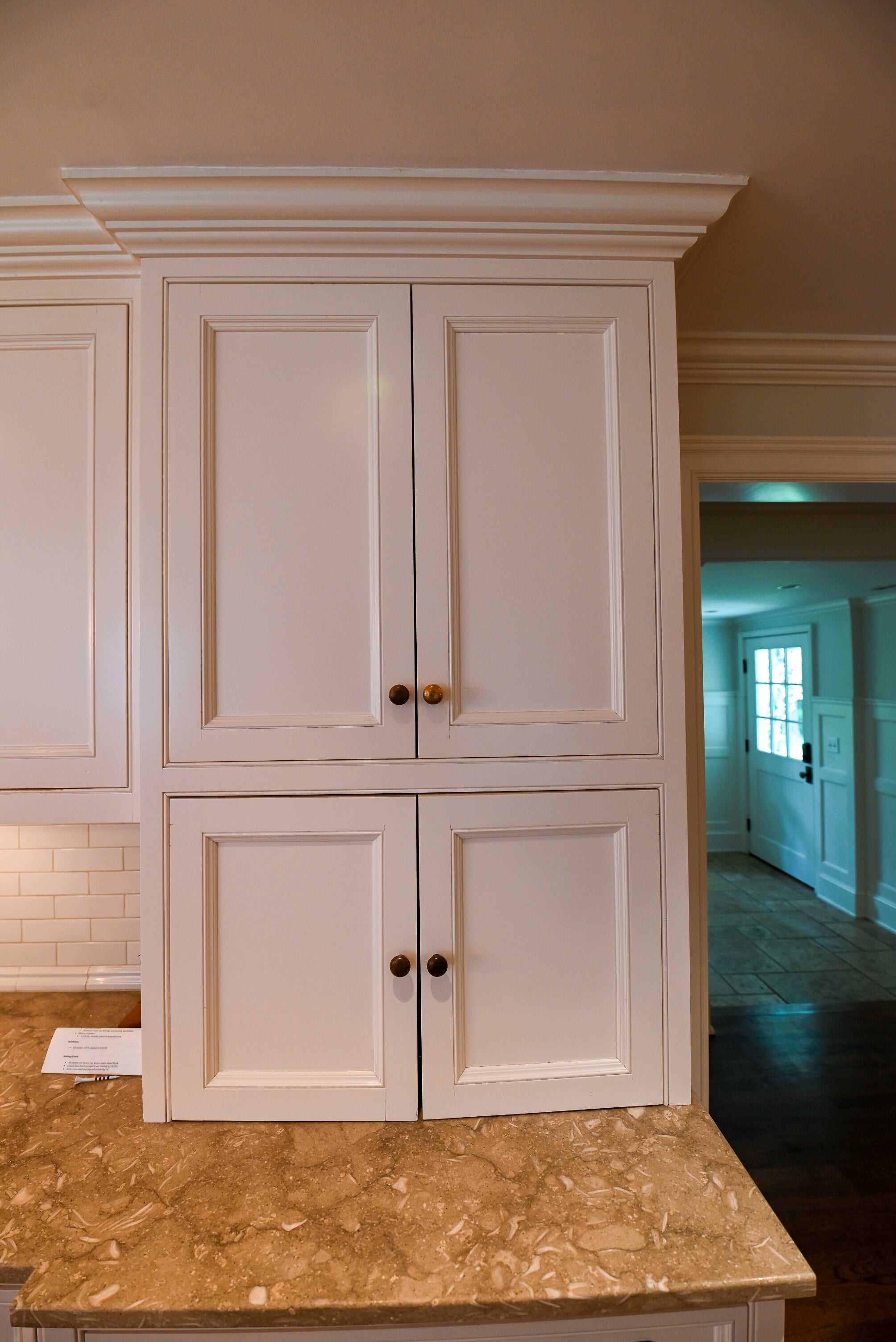 "The Montclair" Transitional White Kitchen with Island & Wolf 48" Range