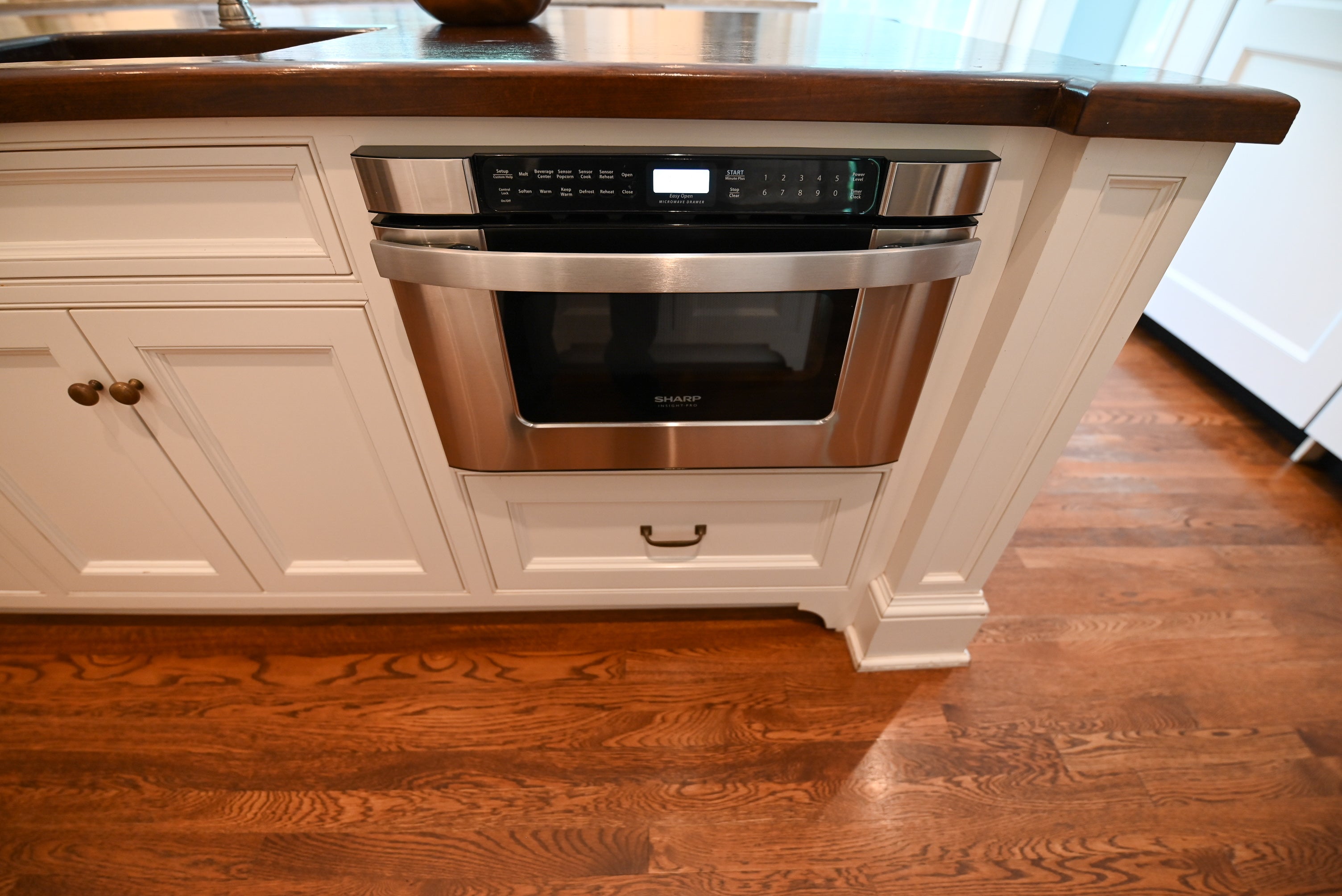 "The Montclair" Transitional White Kitchen with Island & Wolf 48" Range