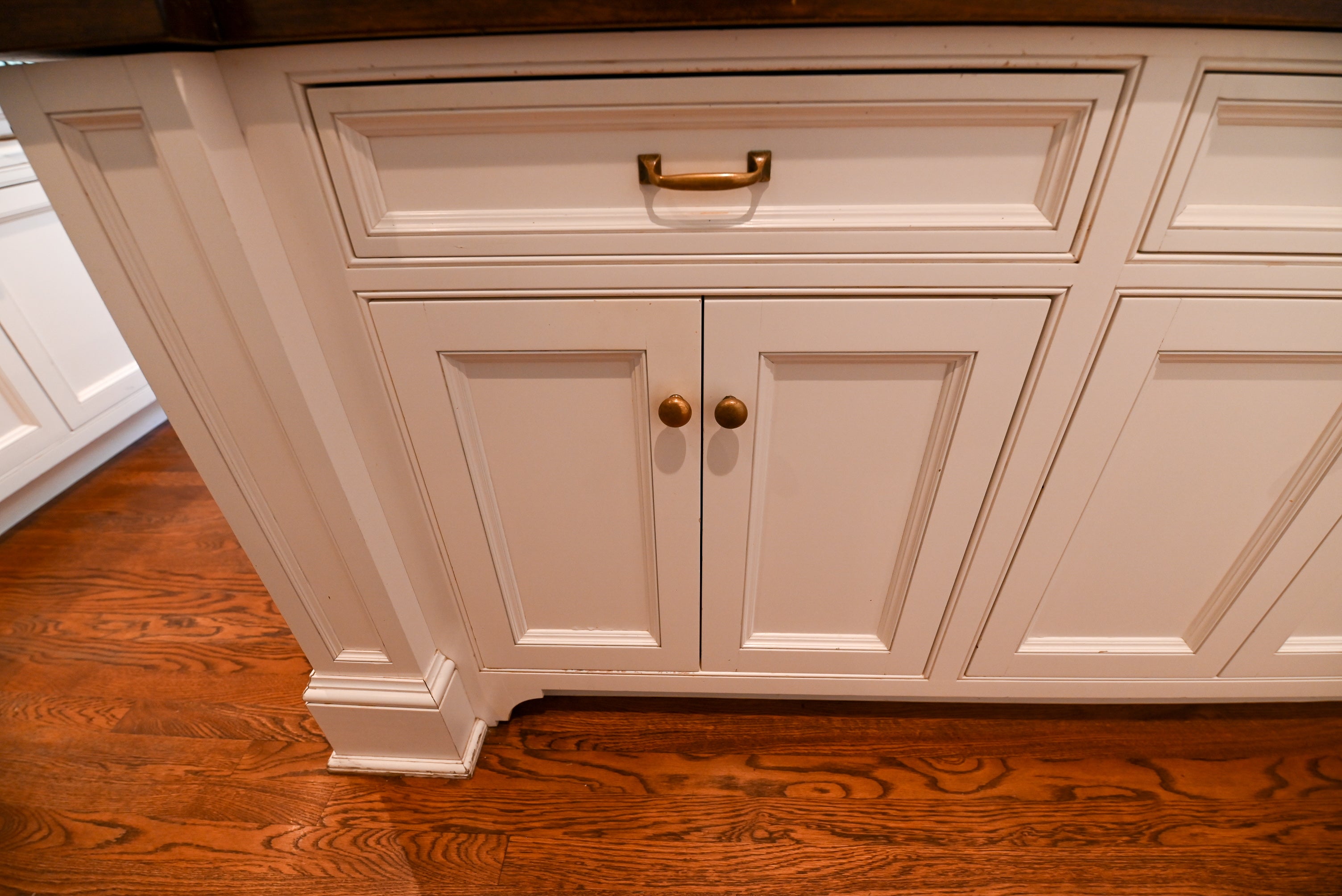 "The Montclair" Transitional White Kitchen with Island & Wolf 48" Range