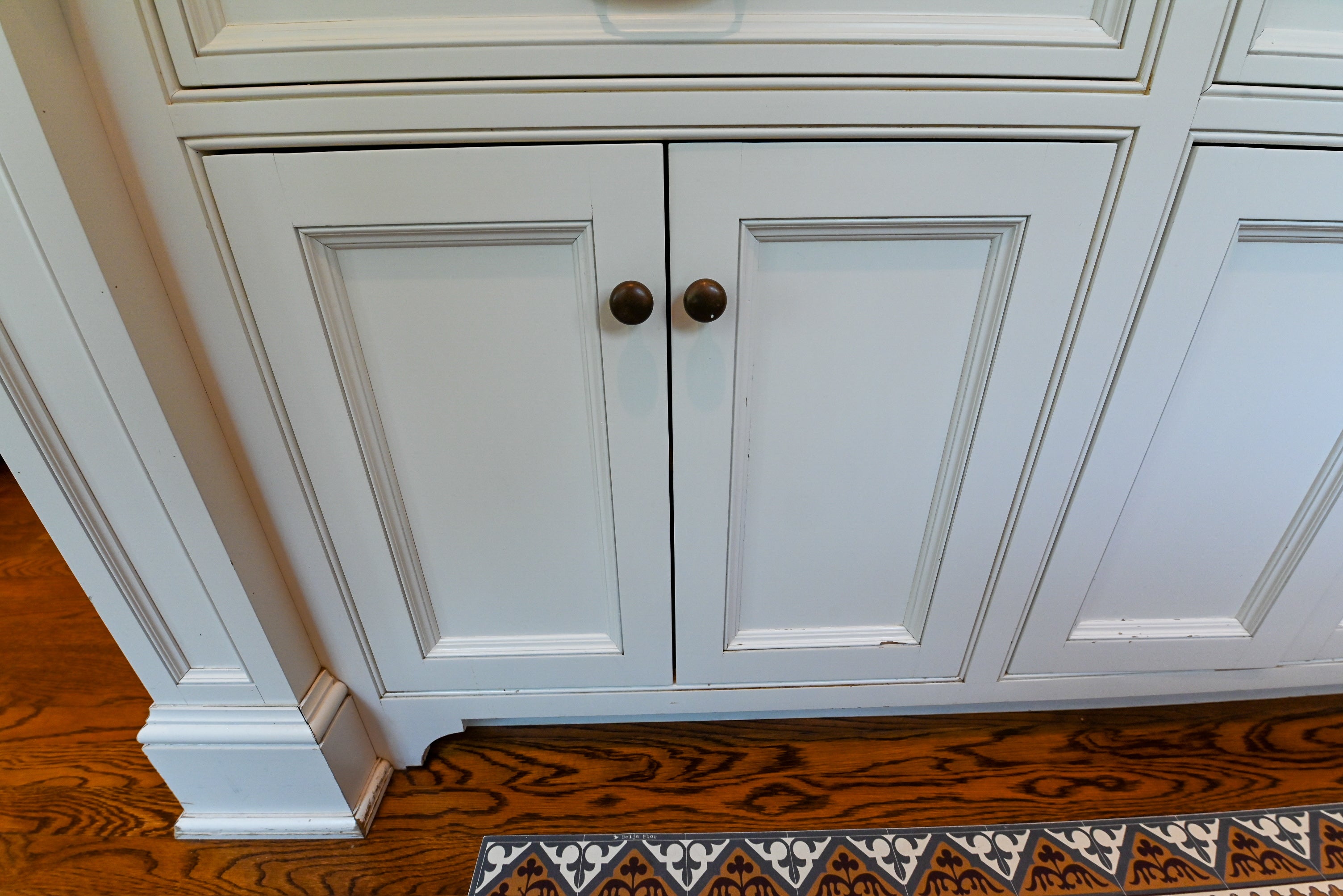 "The Montclair" Transitional White Kitchen with Island & Wolf 48" Range