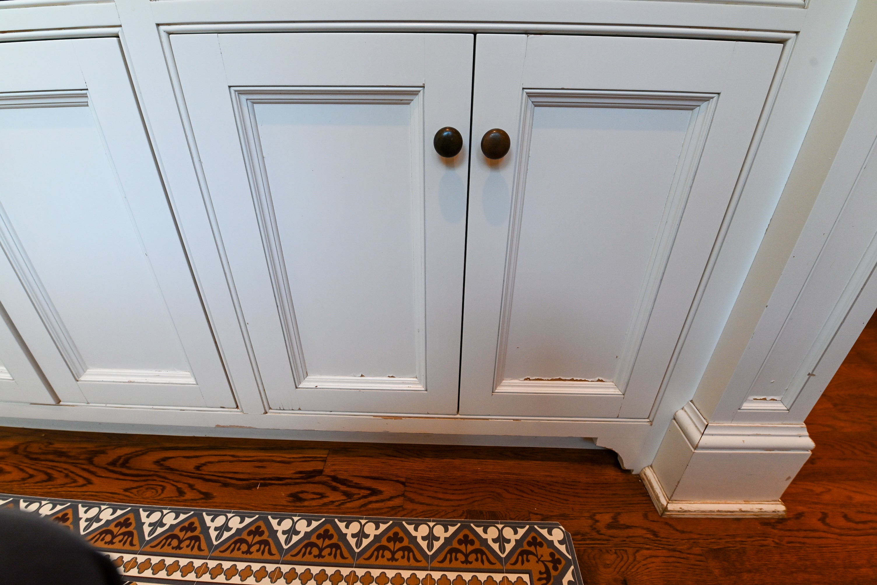"The Montclair" Transitional White Kitchen with Island & Wolf 48" Range