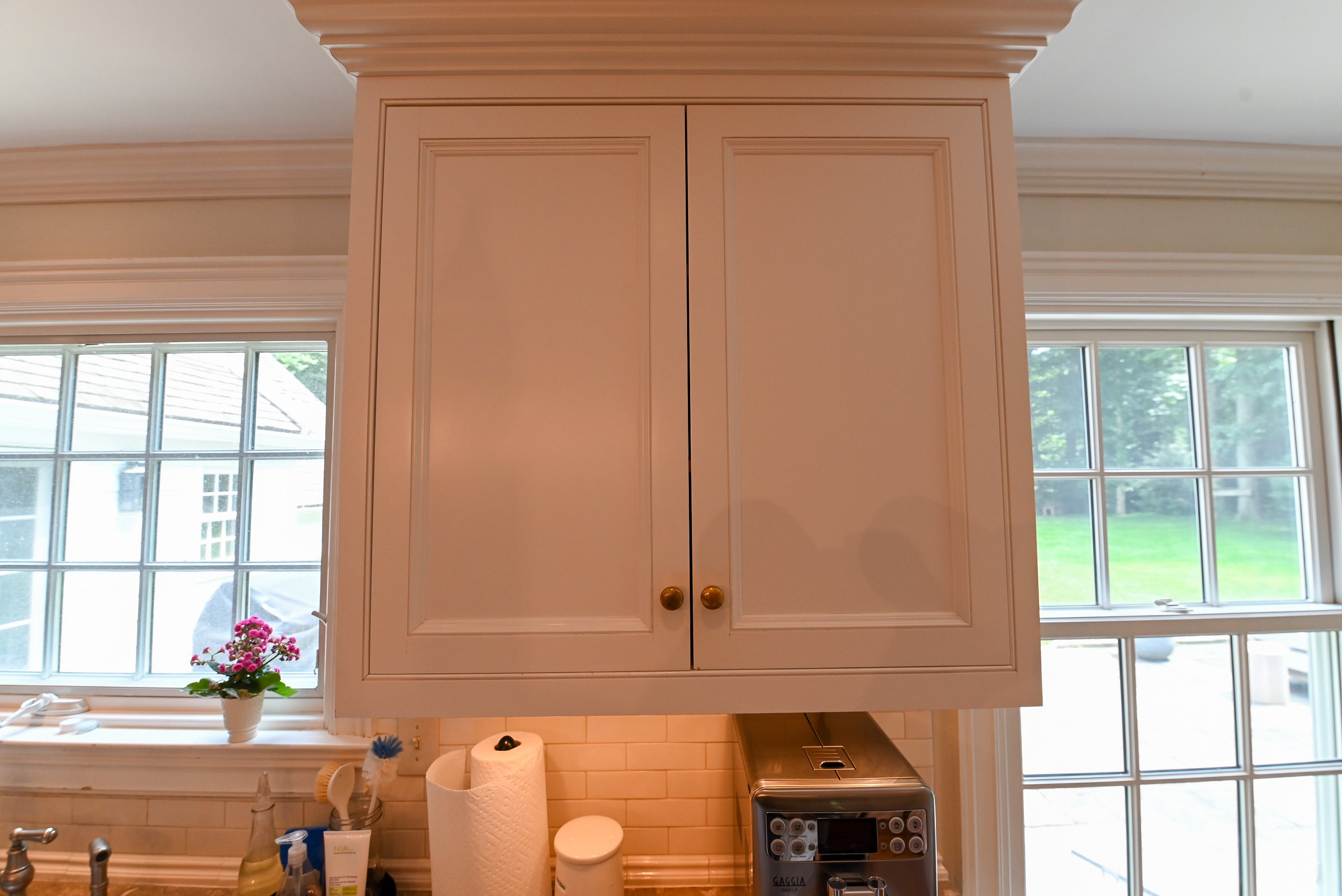 "The Montclair" Transitional White Kitchen with Island & Wolf 48" Range