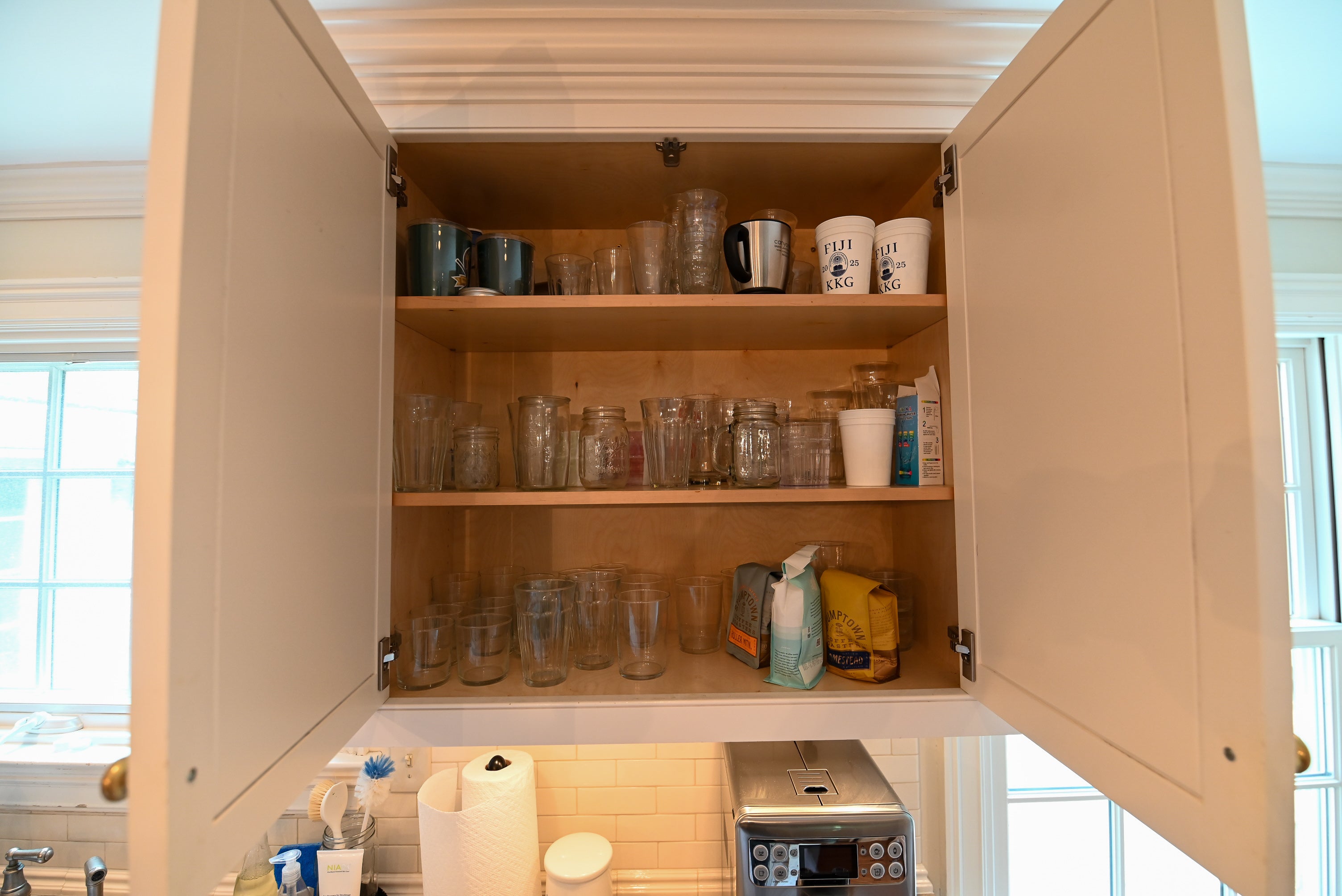 "The Montclair" Transitional White Kitchen with Island & Wolf 48" Range