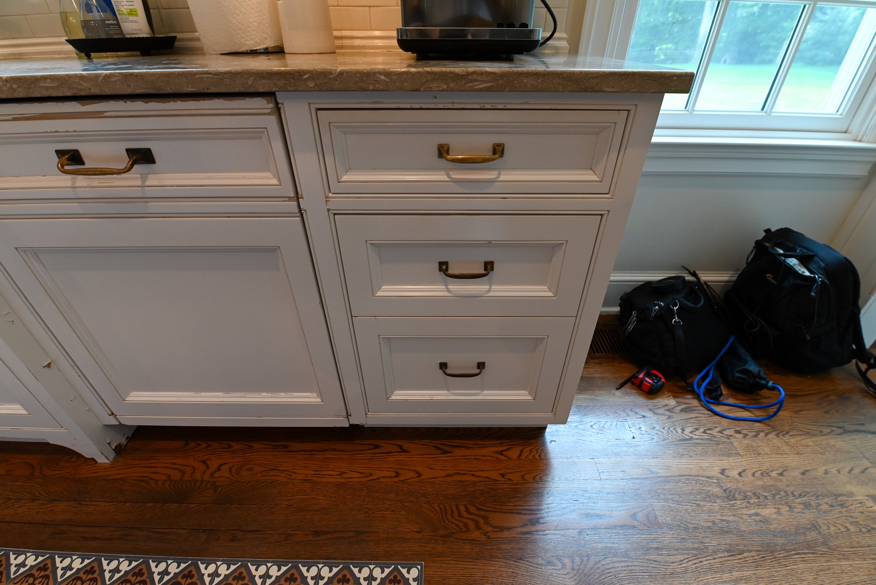 "The Montclair" Transitional White Kitchen with Island & Wolf 48" Range