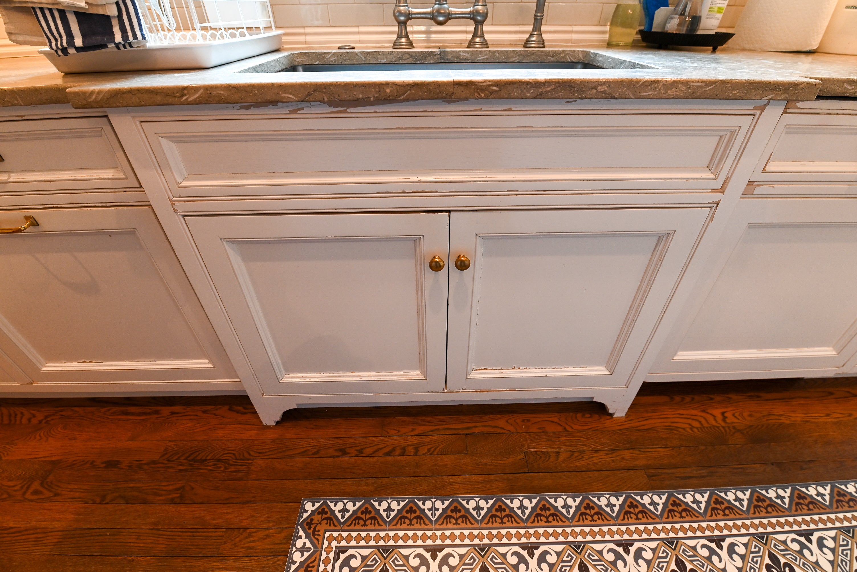 "The Montclair" Transitional White Kitchen with Island & Wolf 48" Range