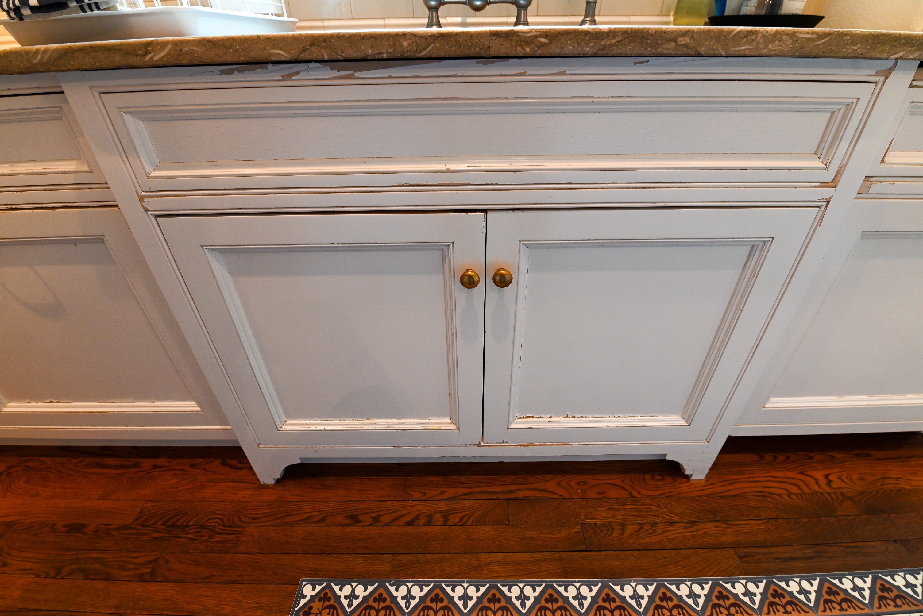 "The Montclair" Transitional White Kitchen with Island & Wolf 48" Range