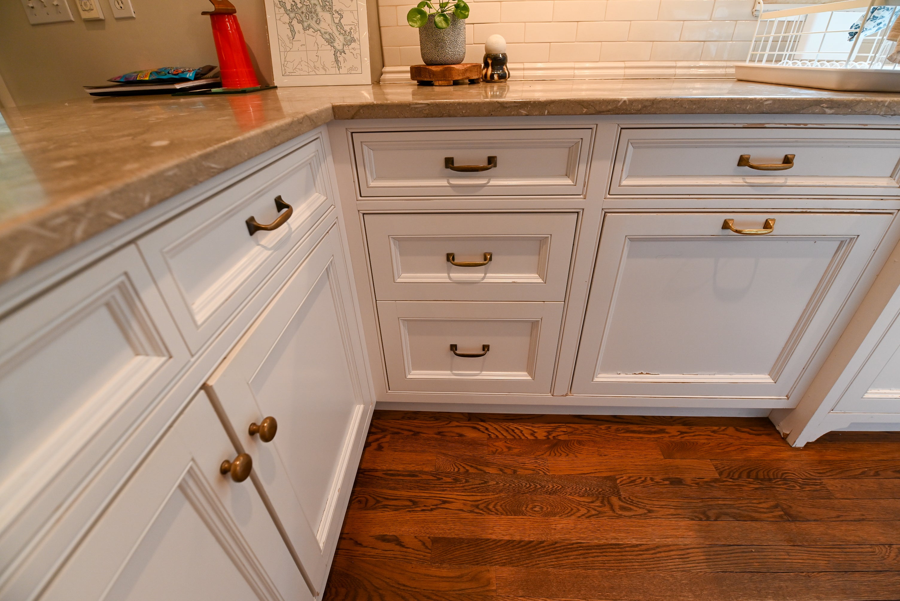 "The Montclair" Transitional White Kitchen with Island & Wolf 48" Range