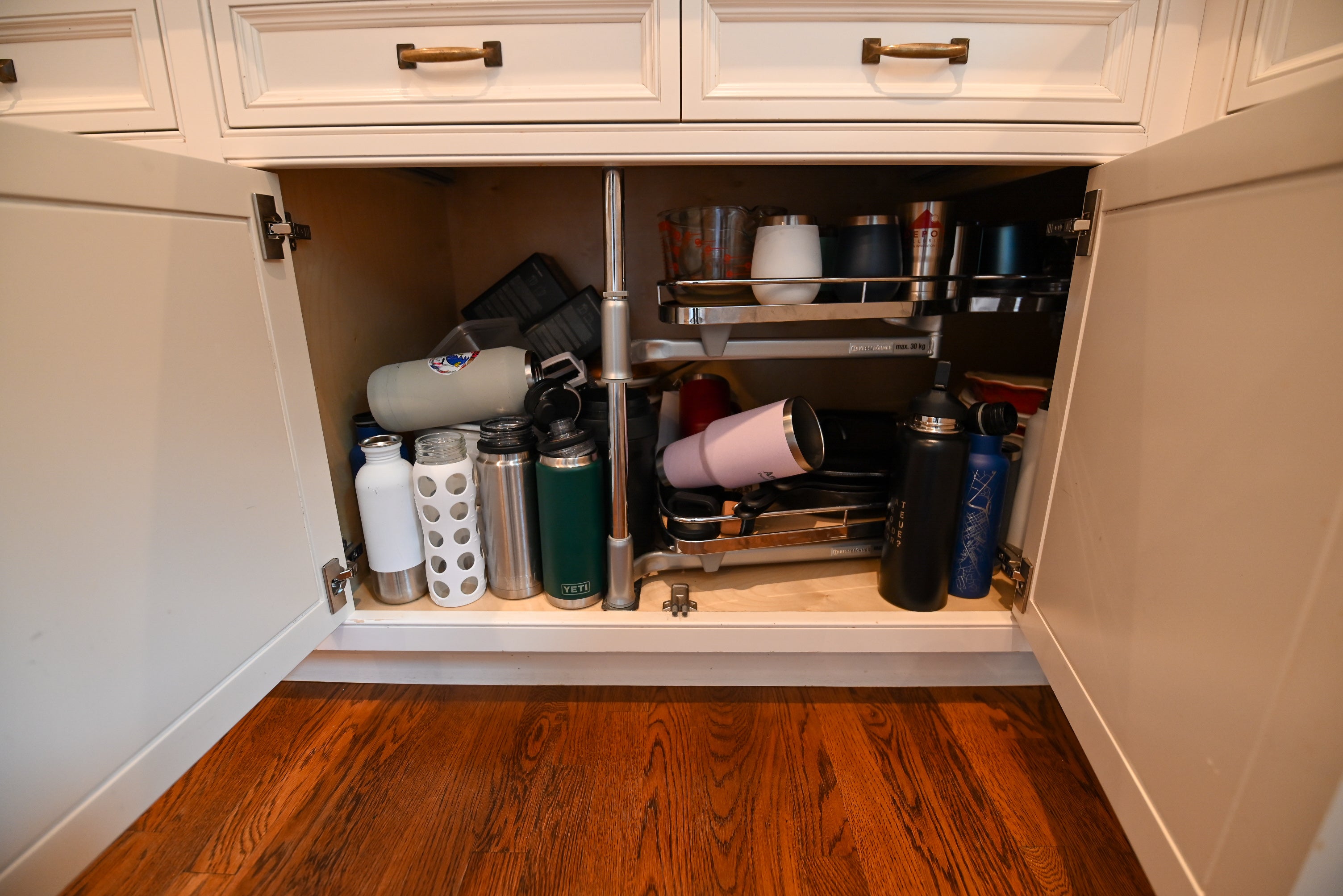 "The Montclair" Transitional White Kitchen with Island & Wolf 48" Range
