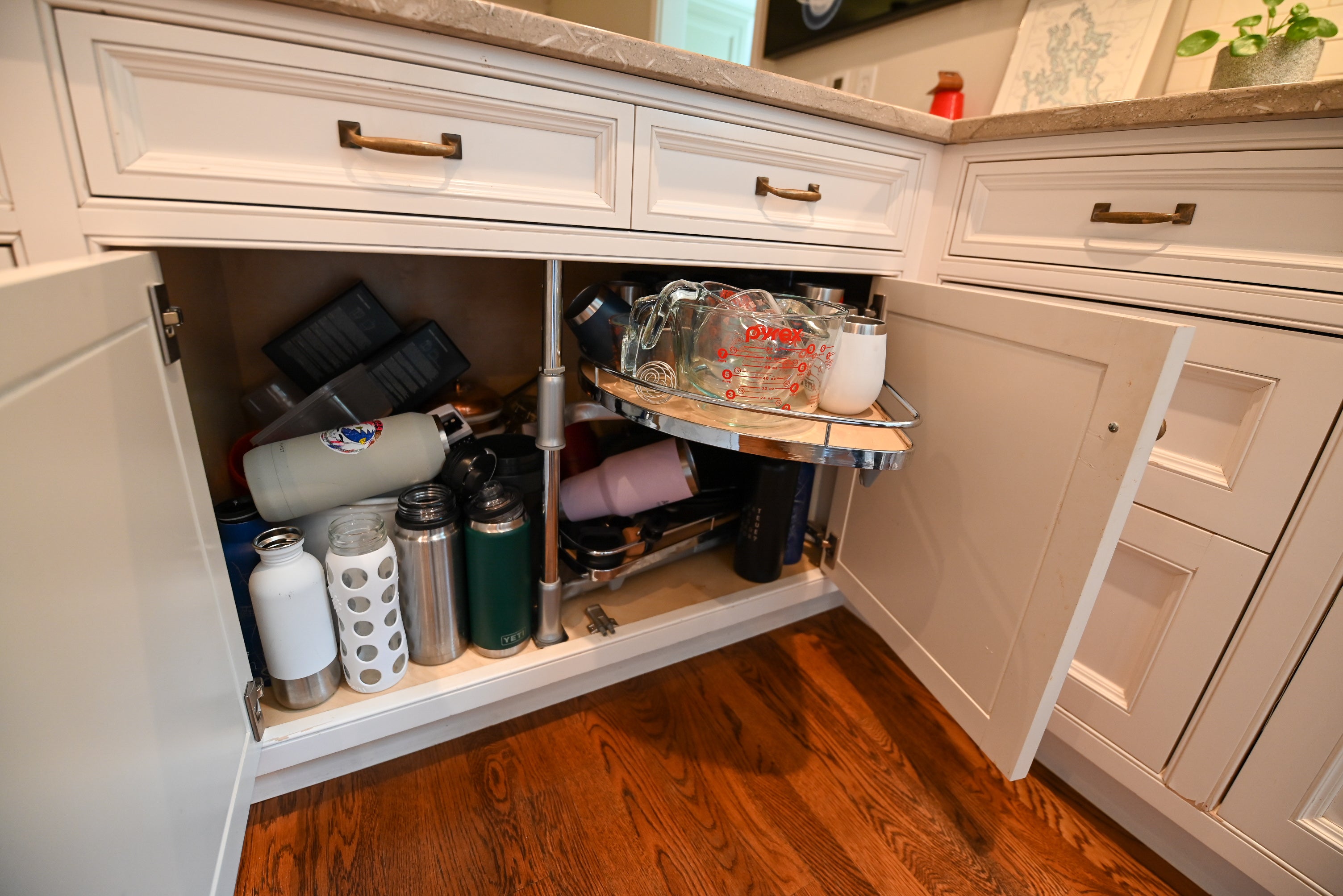 "The Montclair" Transitional White Kitchen with Island & Wolf 48" Range