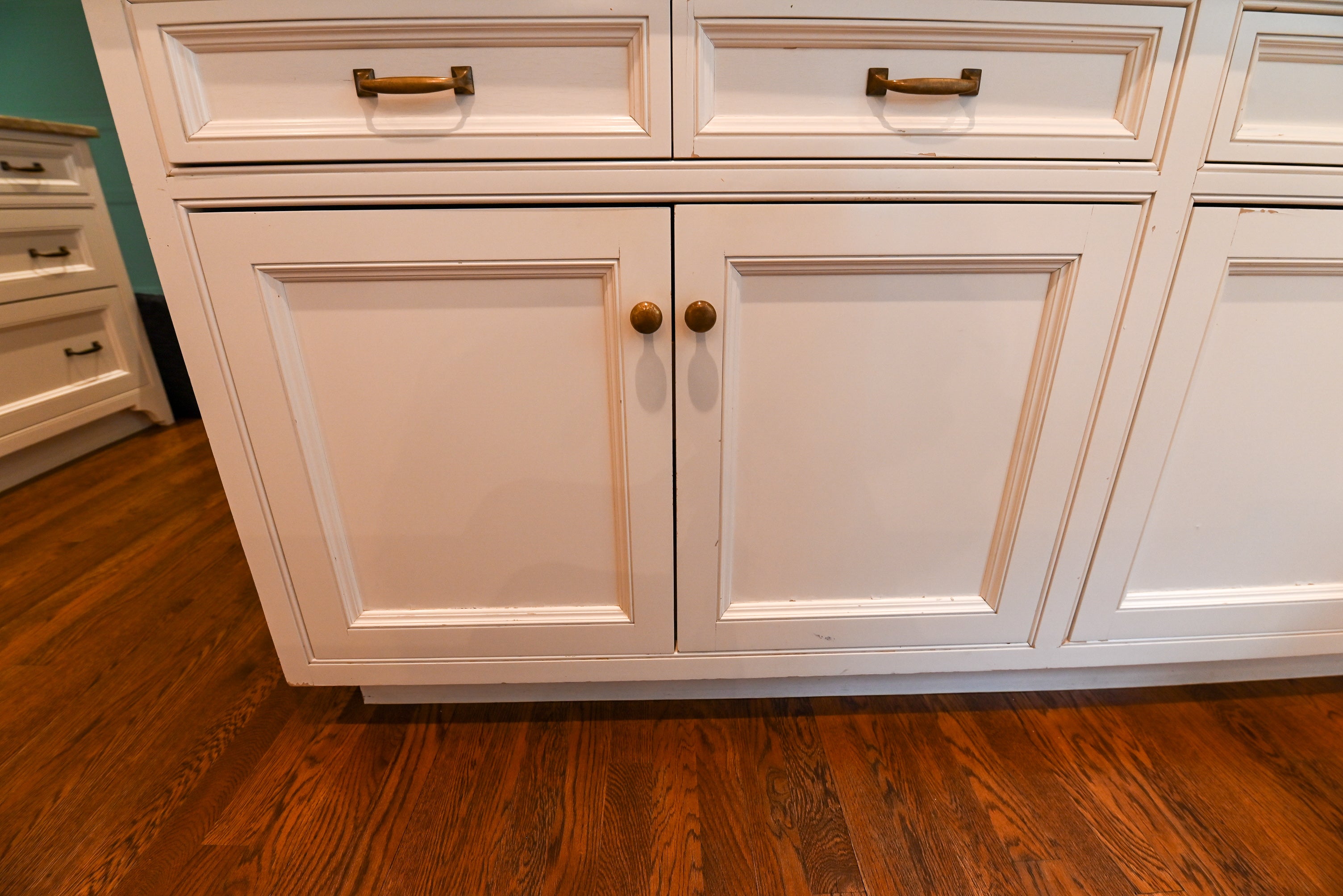 "The Montclair" Transitional White Kitchen with Island & Wolf 48" Range