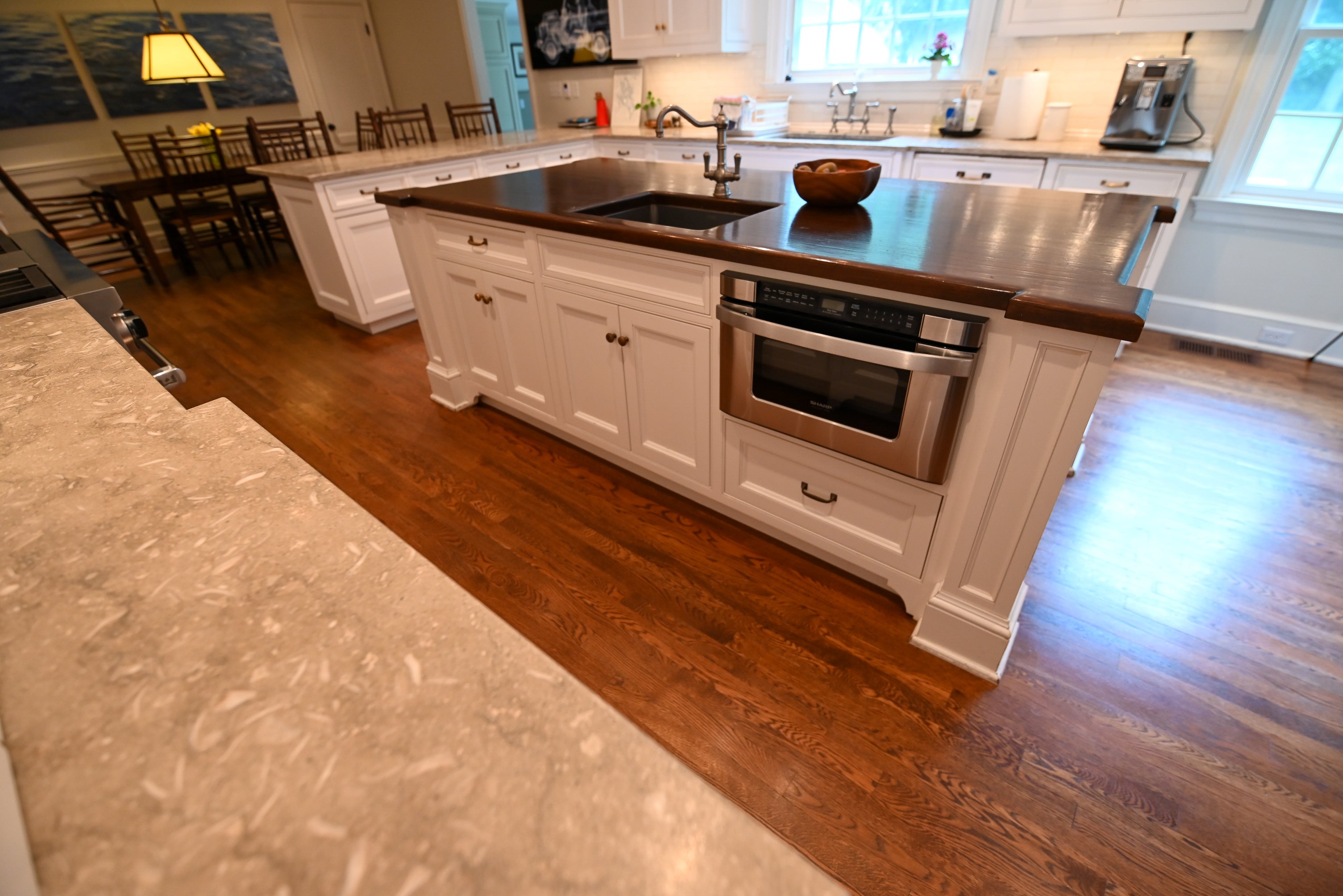 "The Montclair" Transitional White Kitchen with Island & Wolf 48" Range