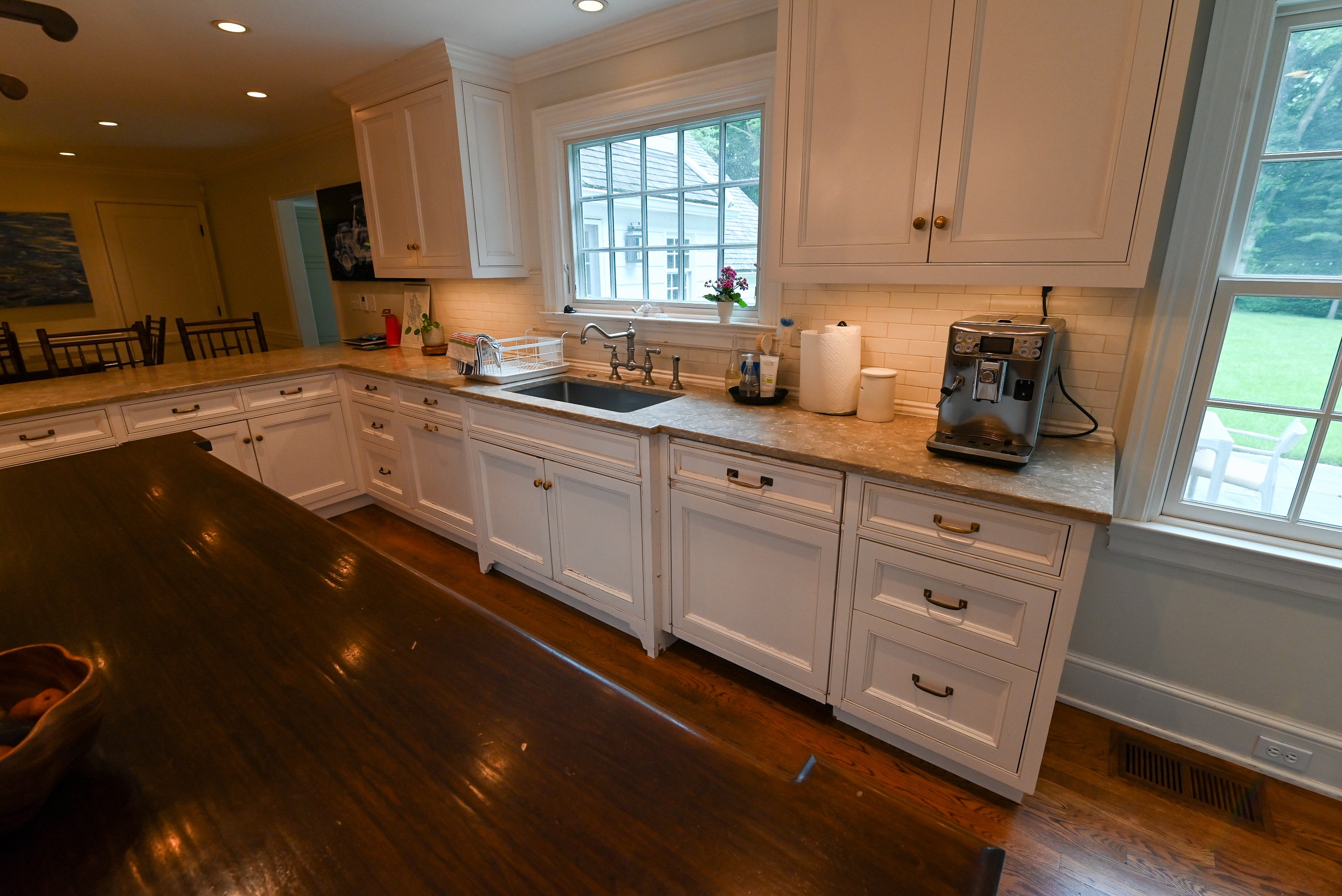 "The Montclair" Transitional White Kitchen with Island & Wolf 48" Range