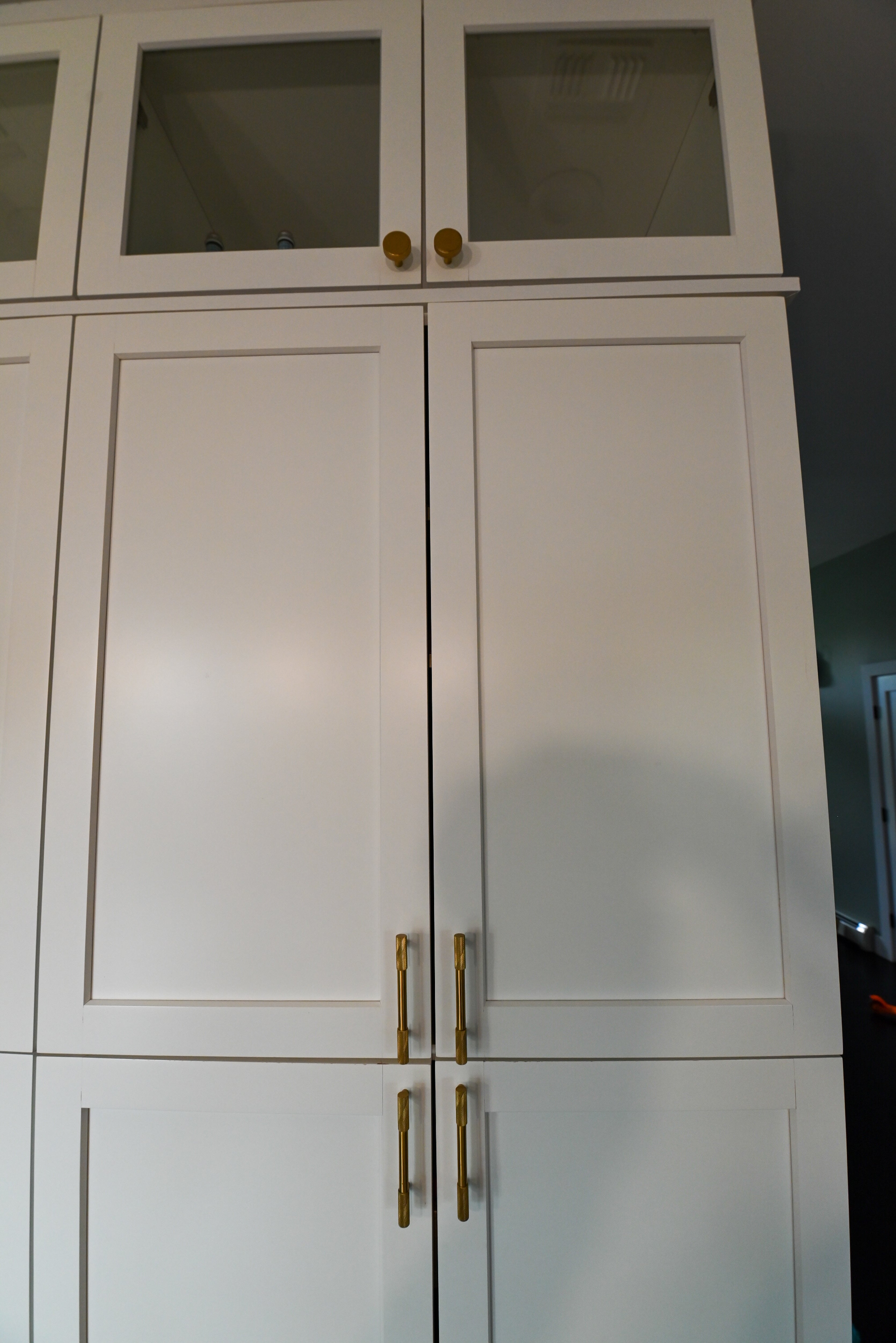 "The Lexington" Transitional White Kitchen with Black Island & Appliances