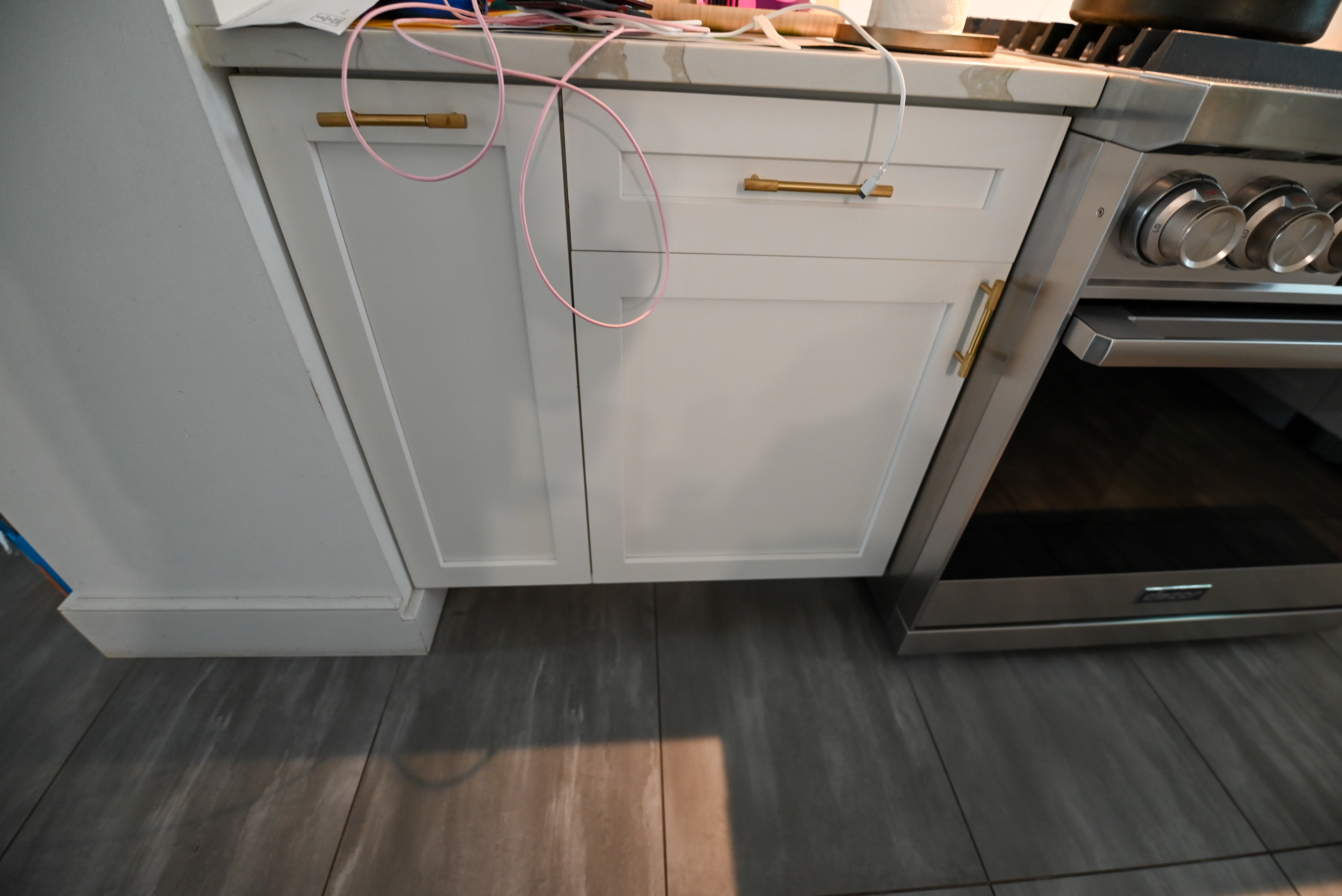 "The Lexington" Transitional White Kitchen with Black Island & Appliances