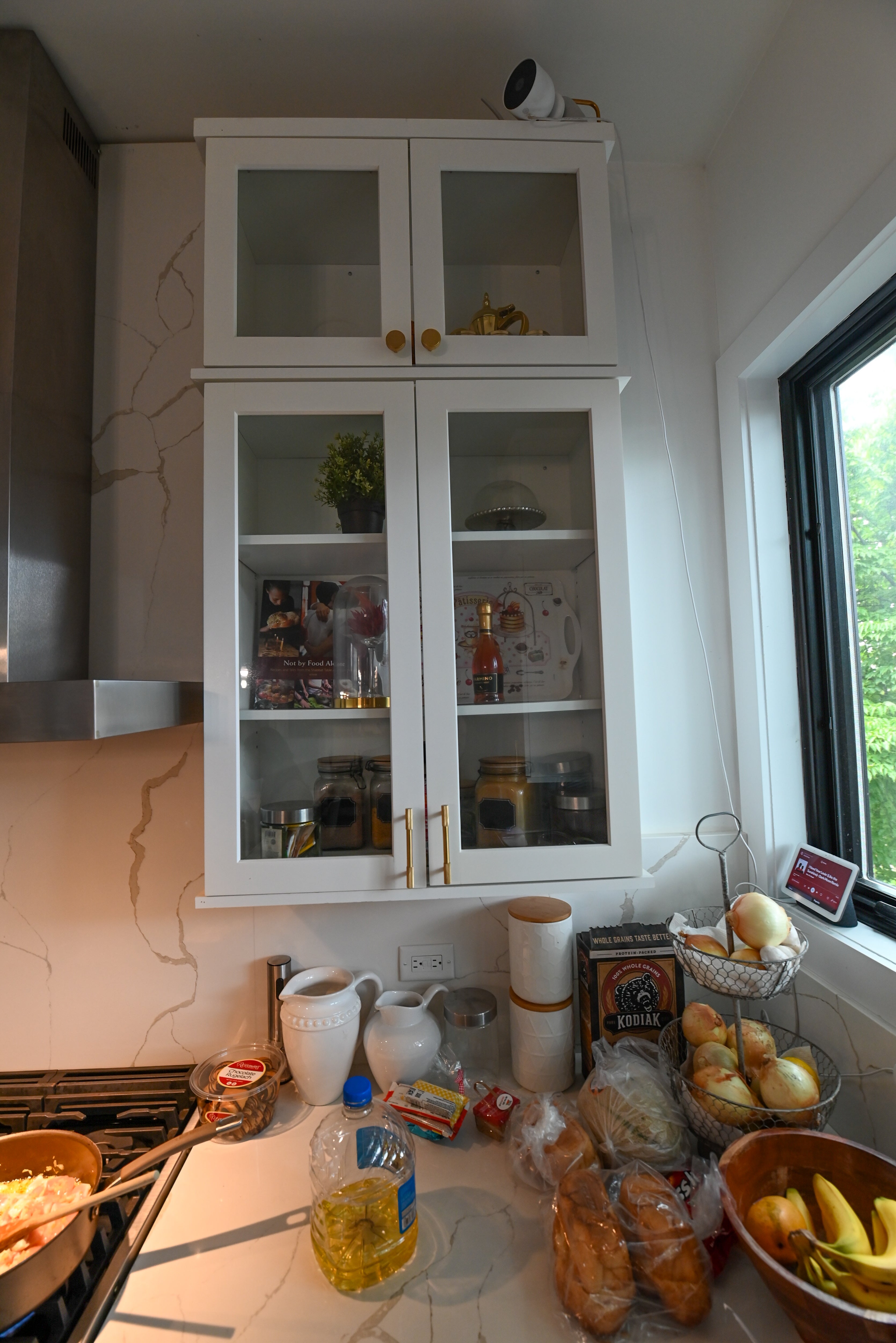 "The Lexington" Transitional White Kitchen with Black Island & Appliances