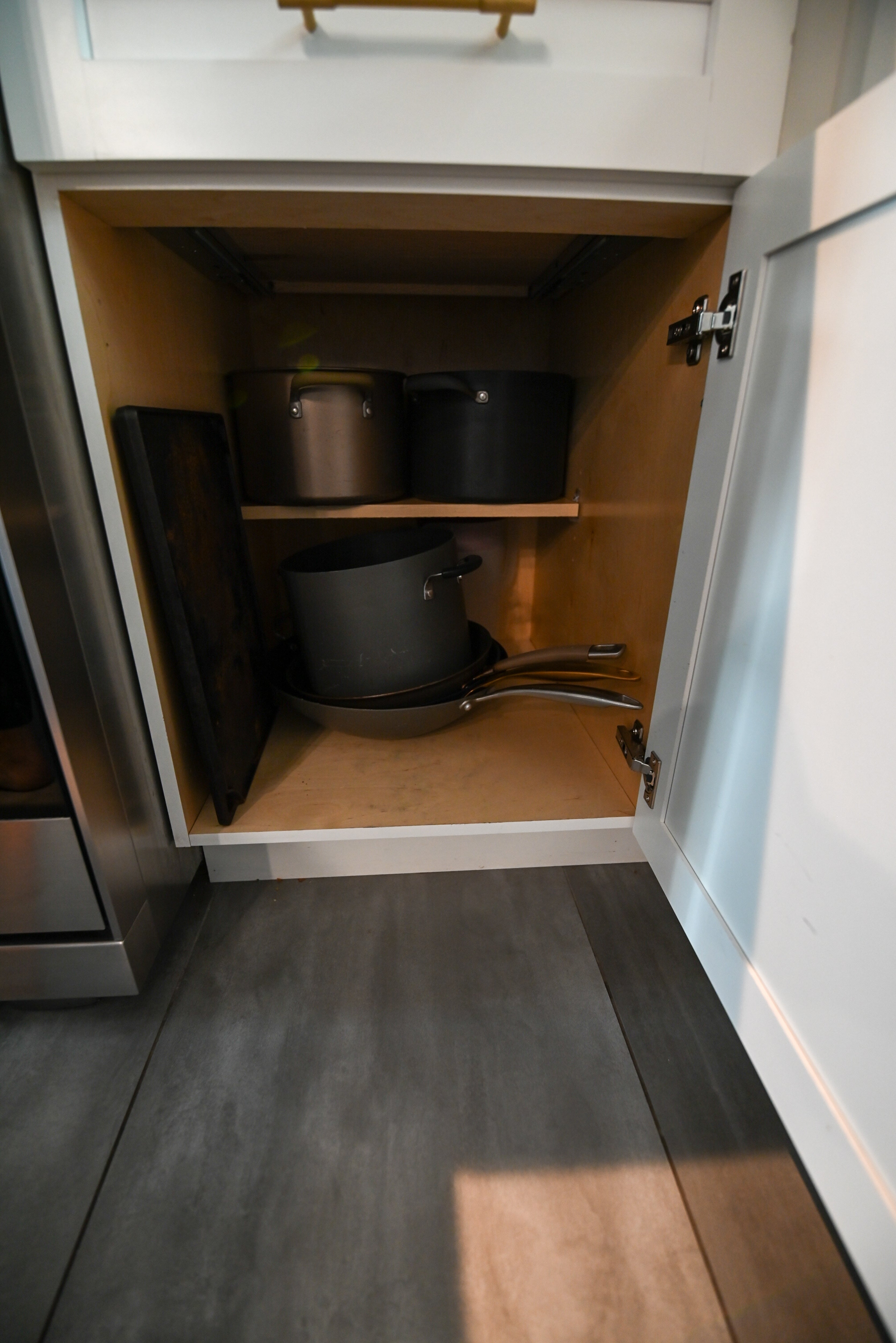 "The Lexington" Transitional White Kitchen with Black Island & Appliances