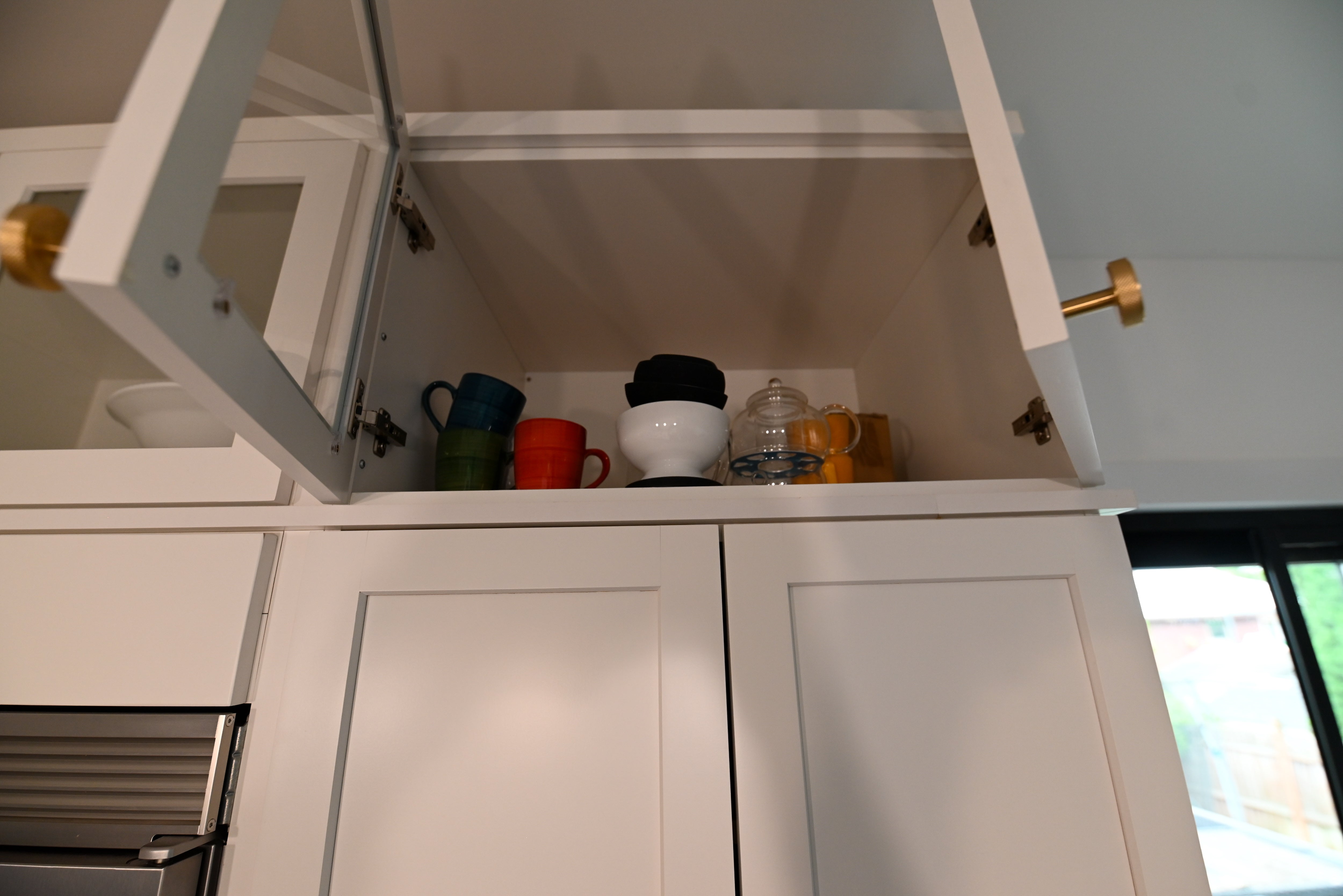 "The Lexington" Transitional White Kitchen with Black Island & Appliances