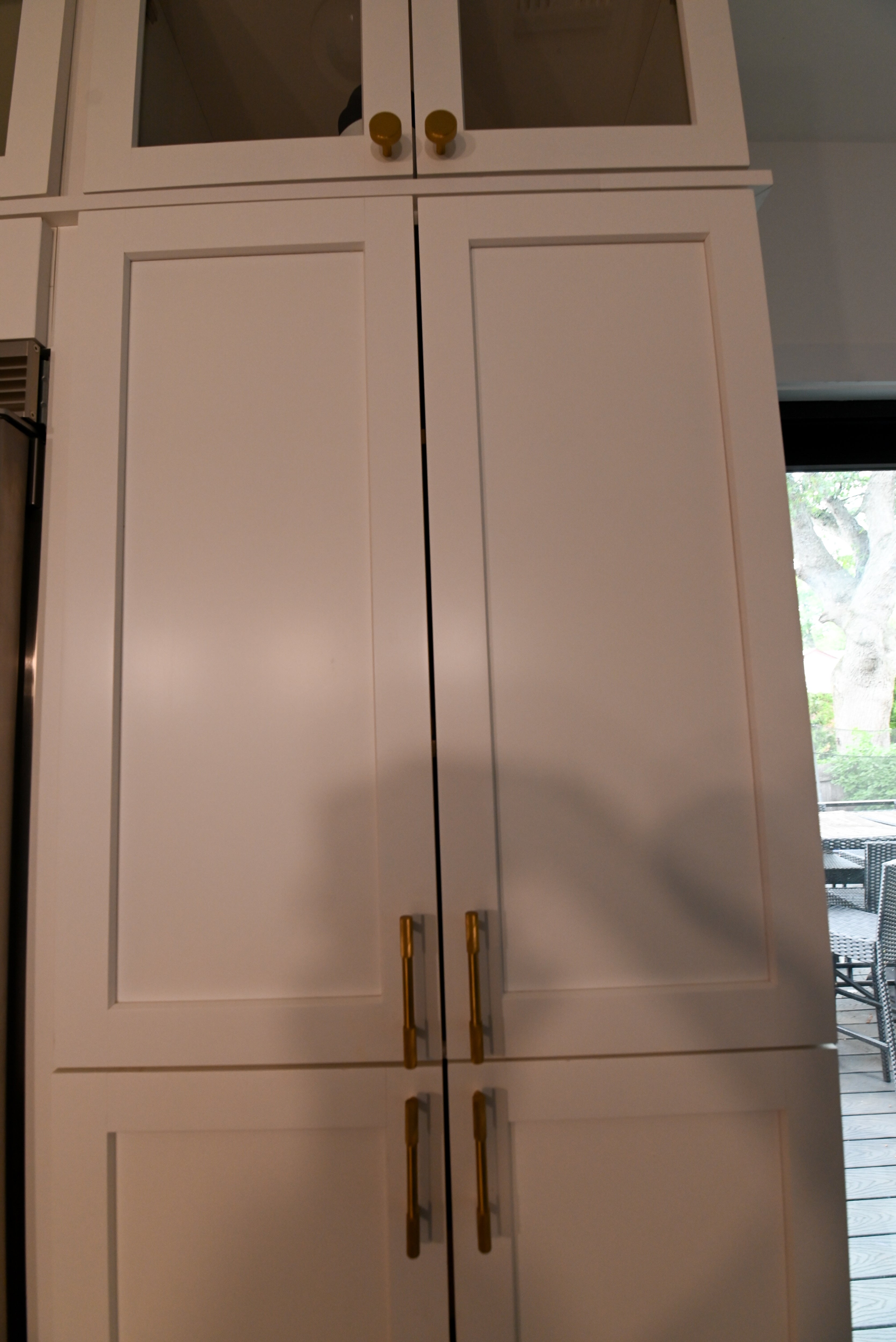 "The Lexington" Transitional White Kitchen with Black Island & Appliances