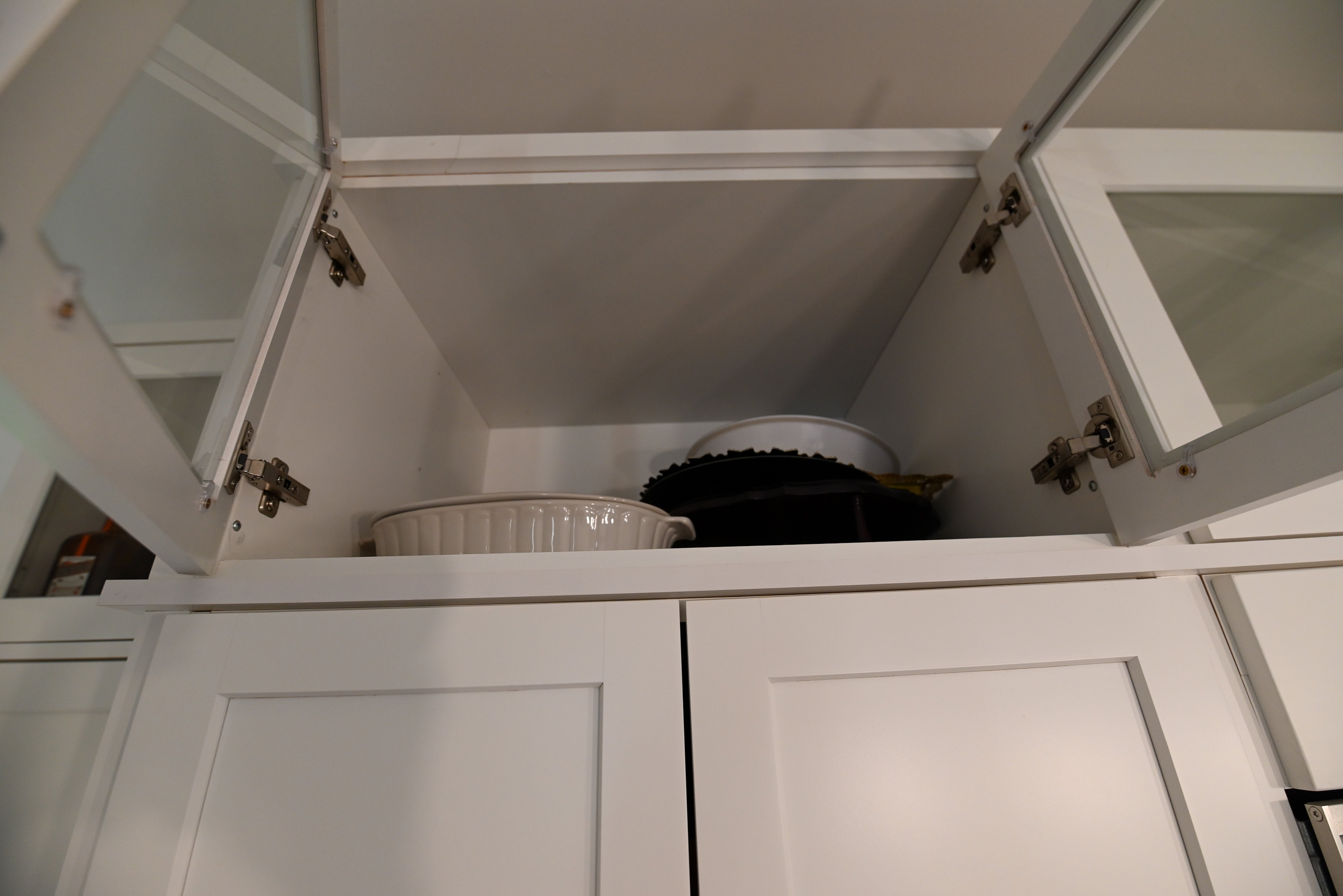 "The Lexington" Transitional White Kitchen with Black Island & Appliances