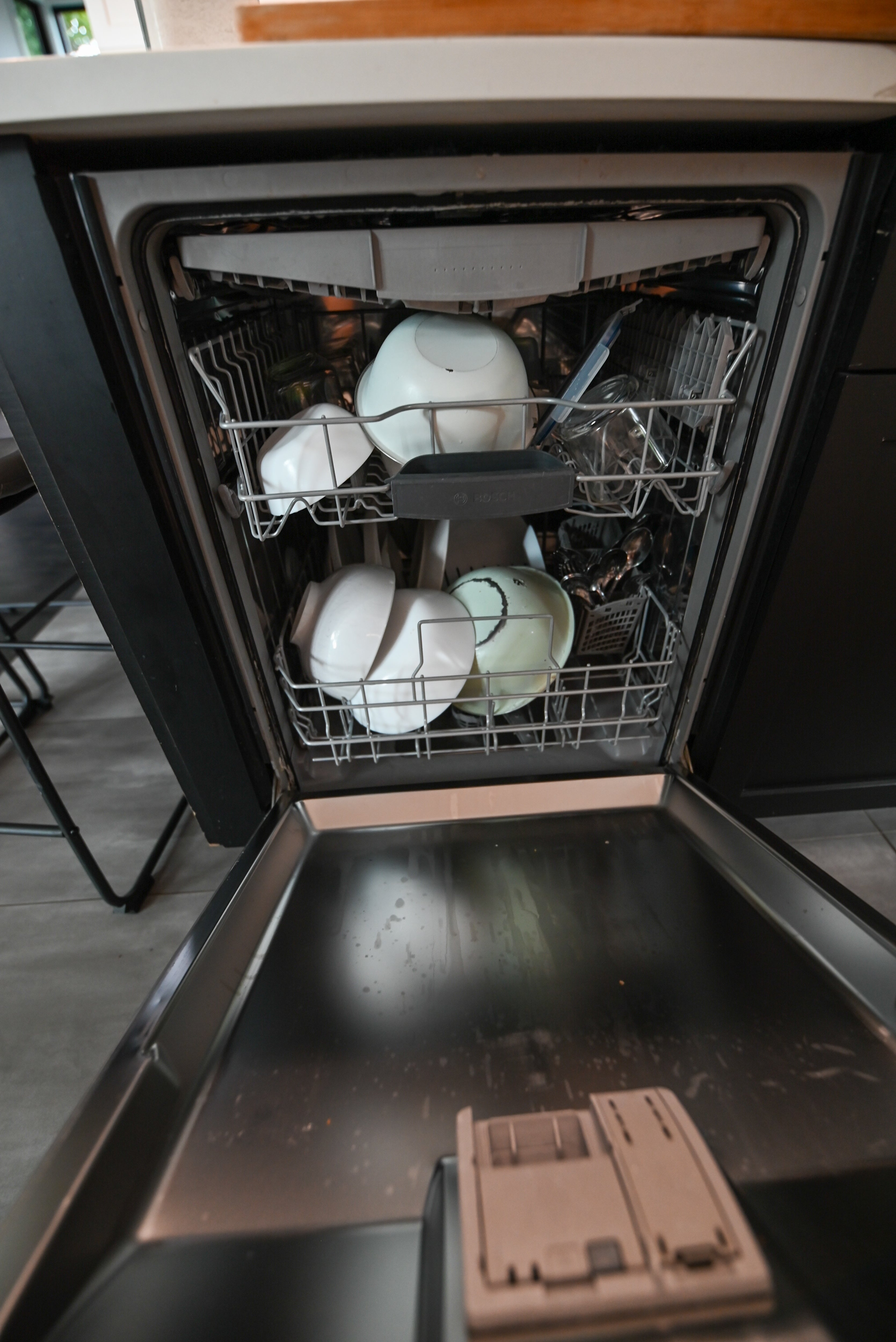 "The Lexington" Transitional White Kitchen with Black Island & Appliances