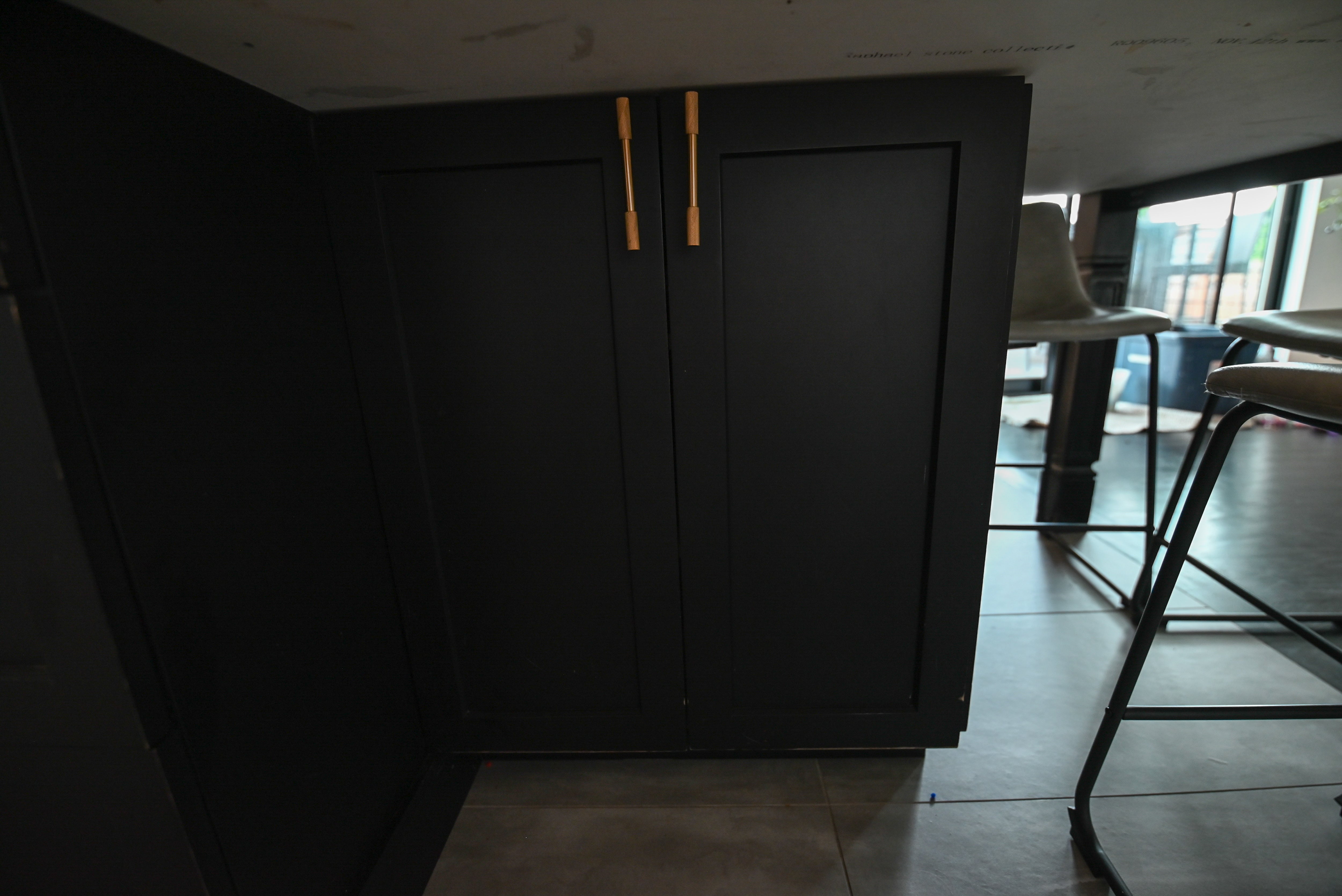 "The Lexington" Transitional White Kitchen with Black Island & Appliances