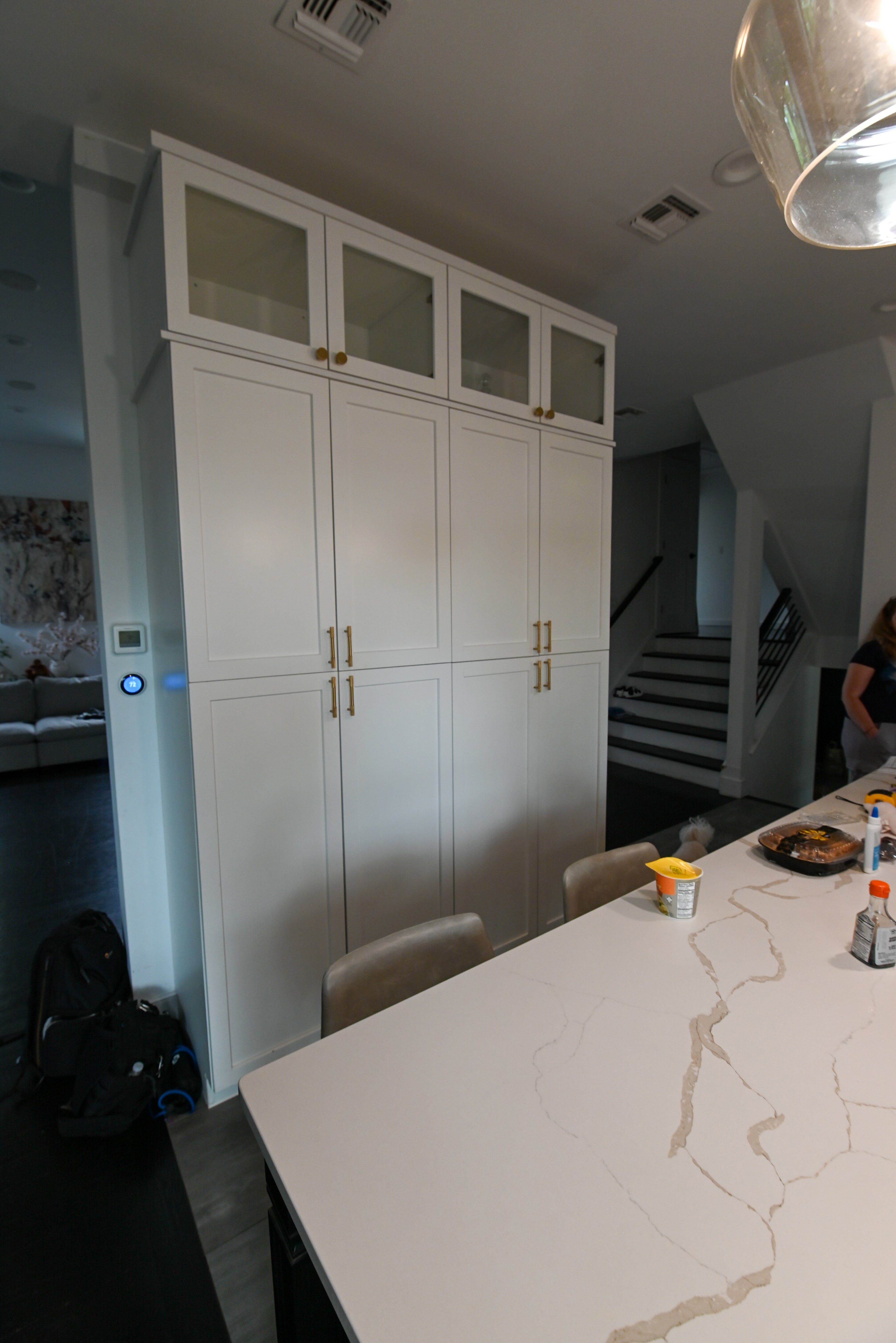 "The Lexington" Transitional White Kitchen with Black Island & Appliances