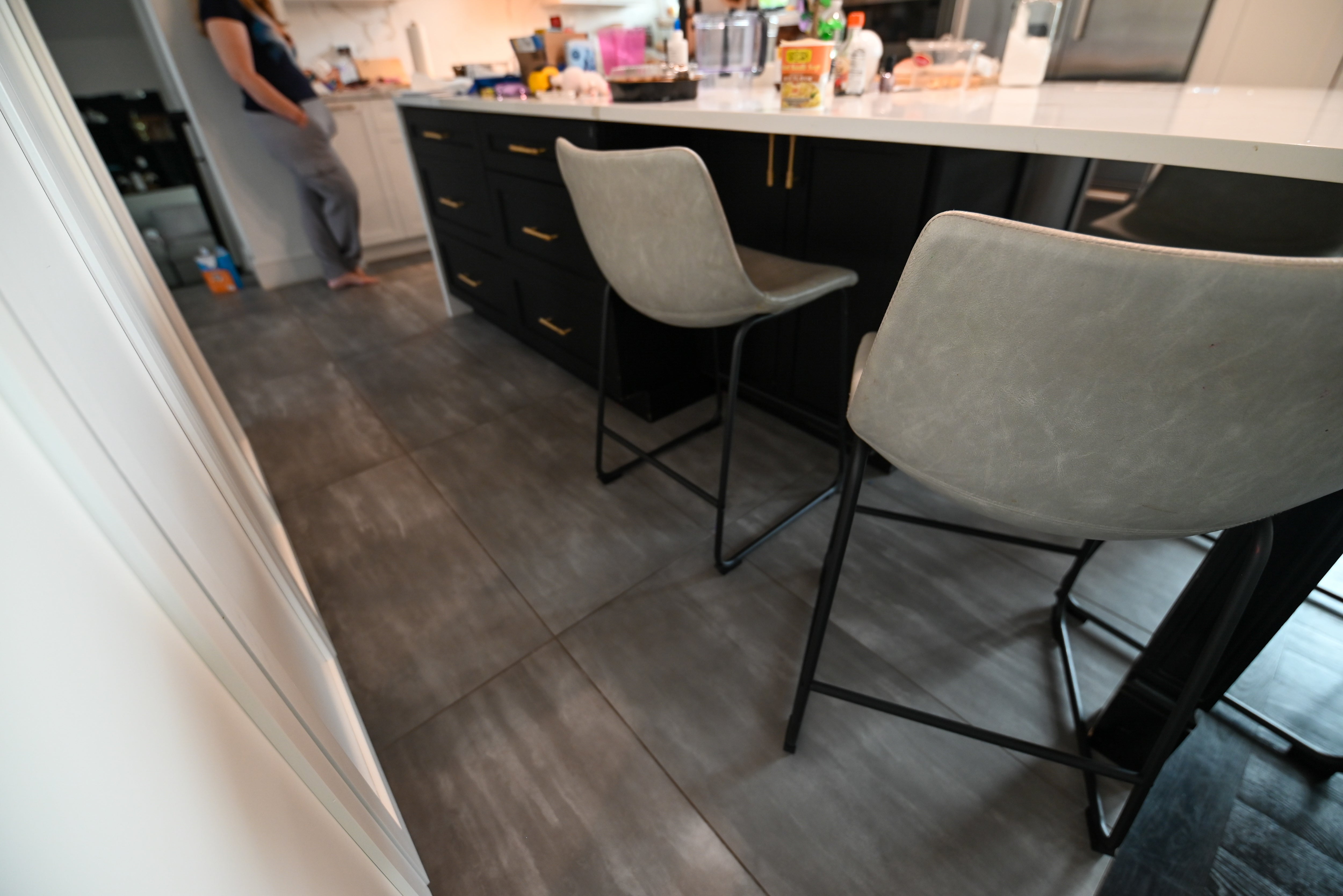 "The Lexington" Transitional White Kitchen with Black Island & Appliances