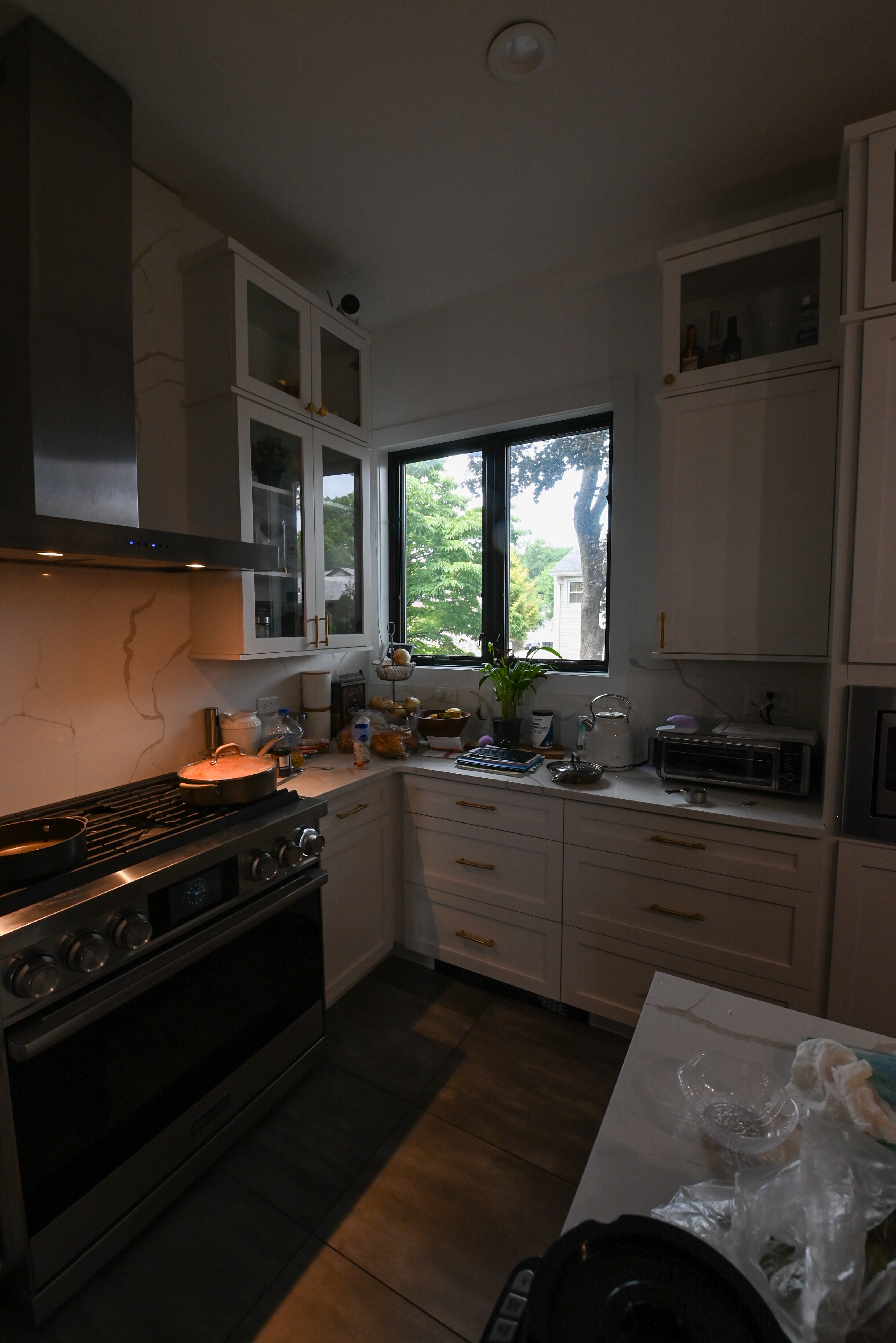 "The Lexington" Transitional White Kitchen with Black Island & Appliances