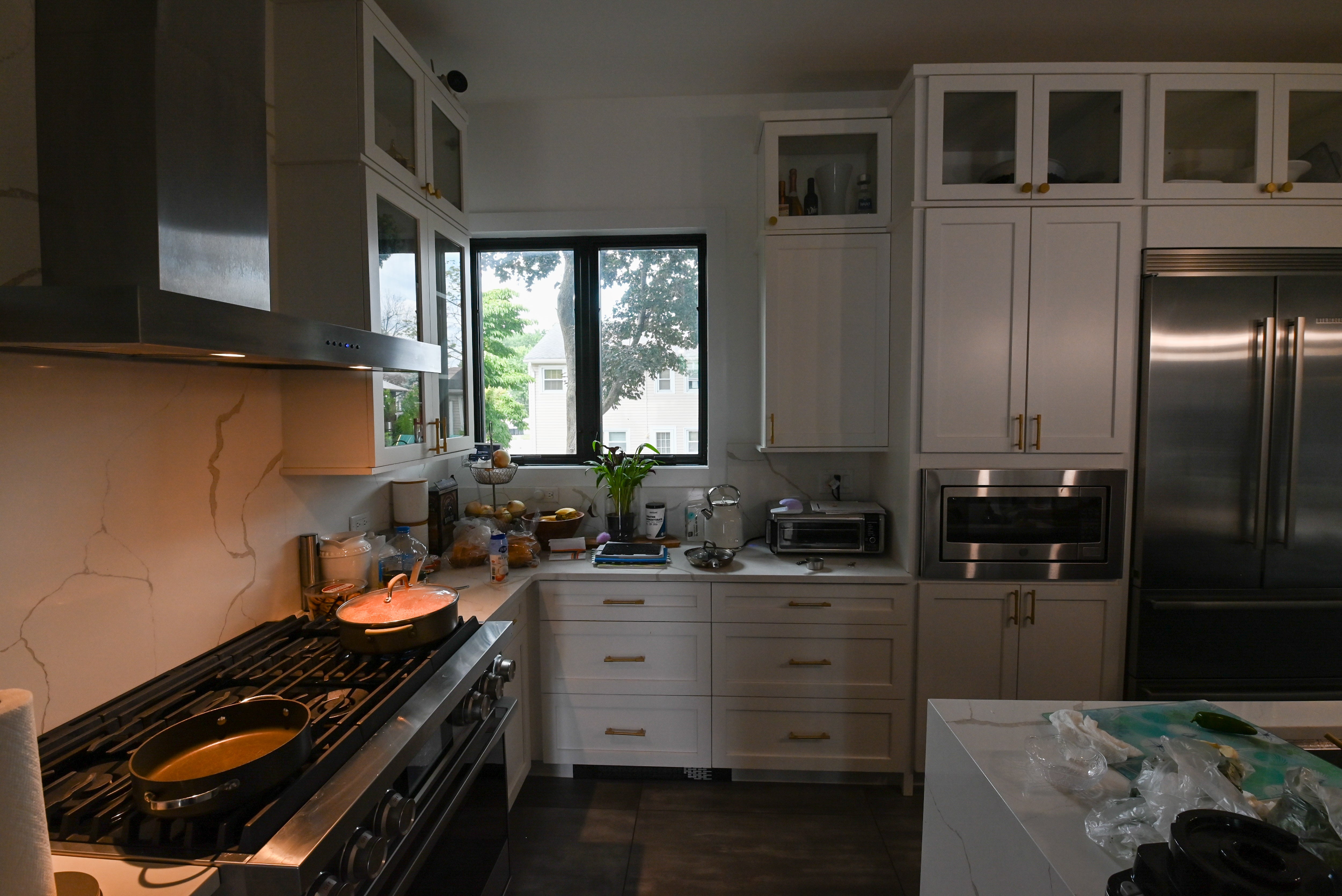 "The Lexington" Transitional White Kitchen with Black Island & Appliances