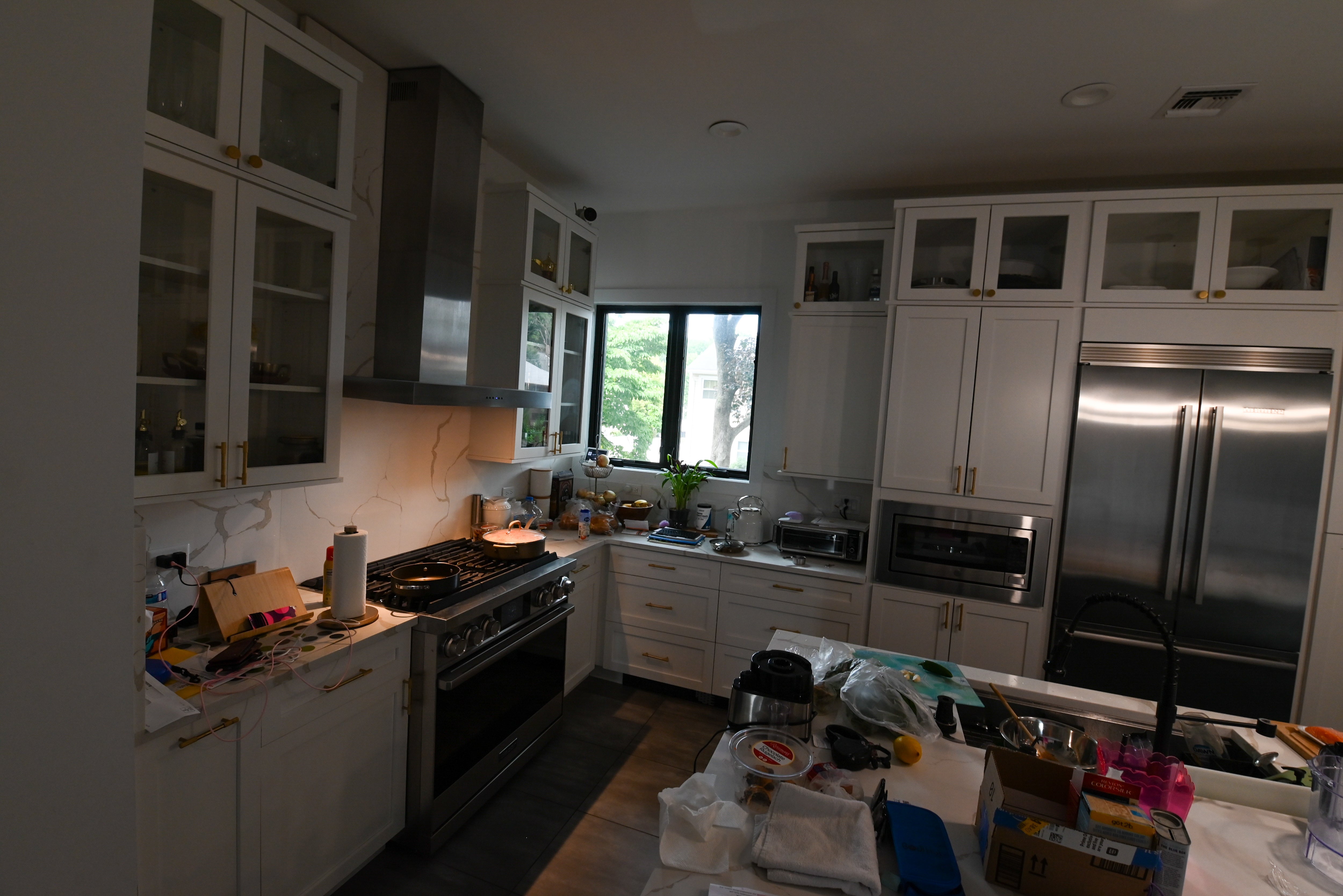 "The Lexington" Transitional White Kitchen with Black Island & Appliances