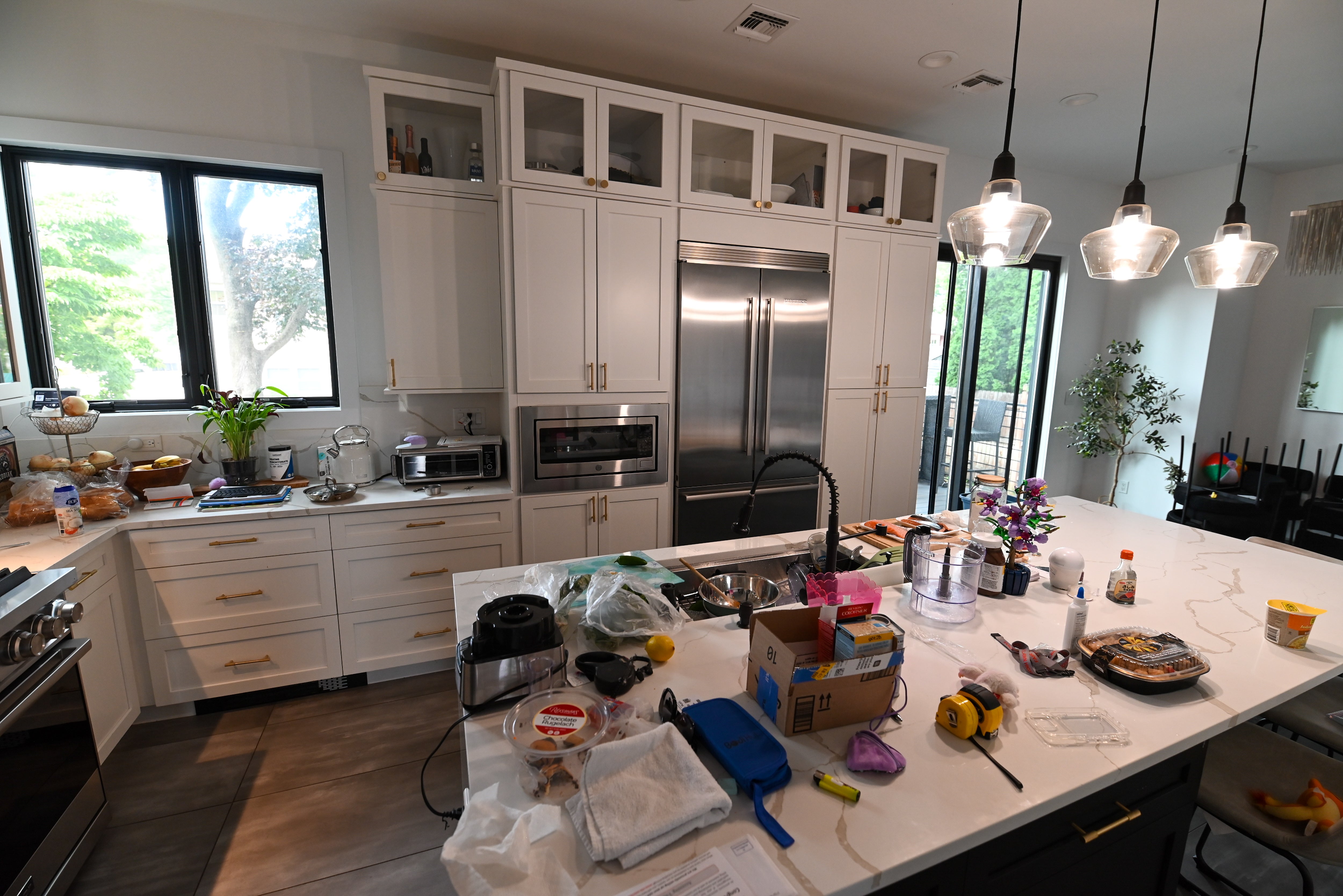 "The Lexington" Transitional White Kitchen with Black Island & Appliances