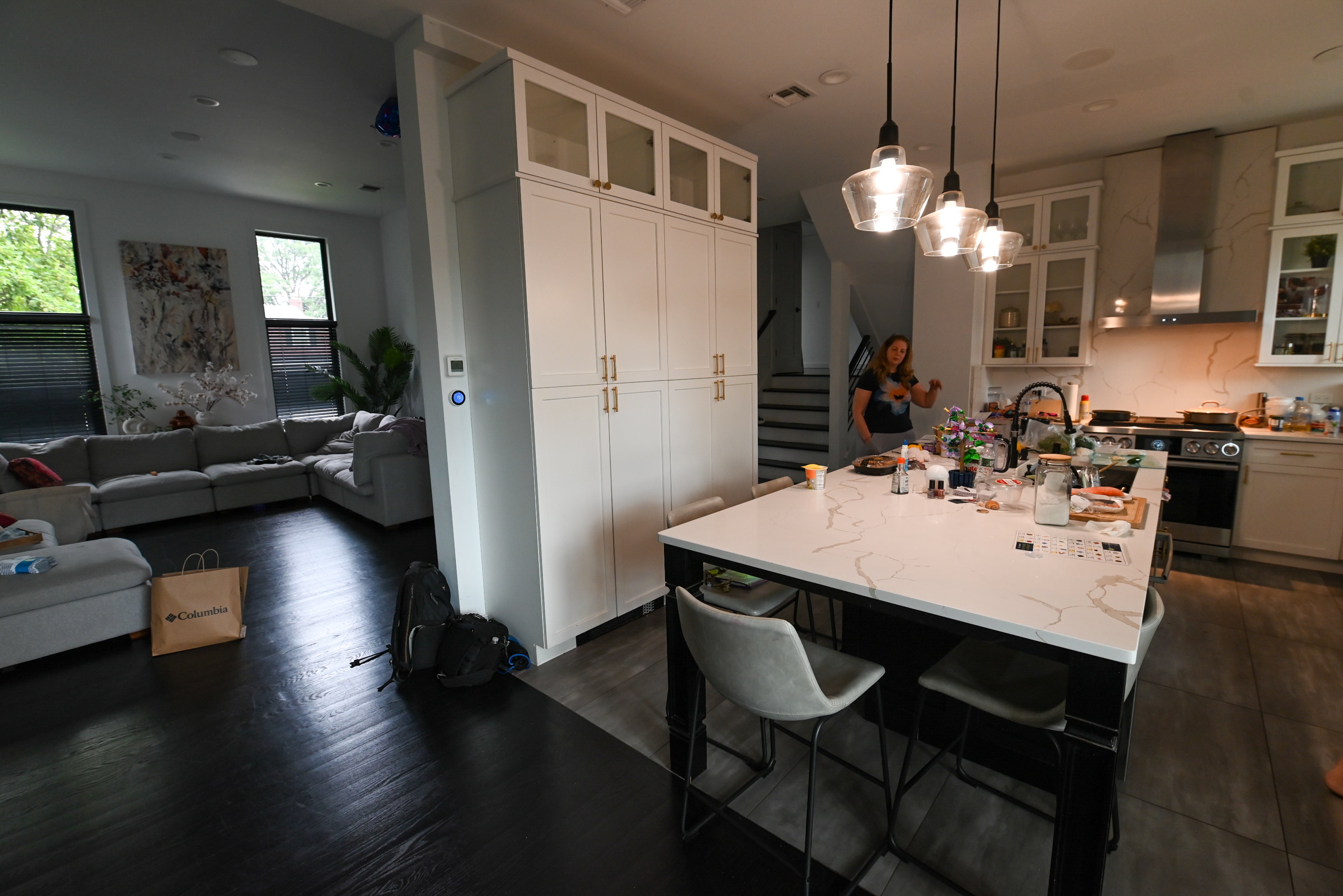 "The Lexington" Transitional White Kitchen with Black Island & Appliances
