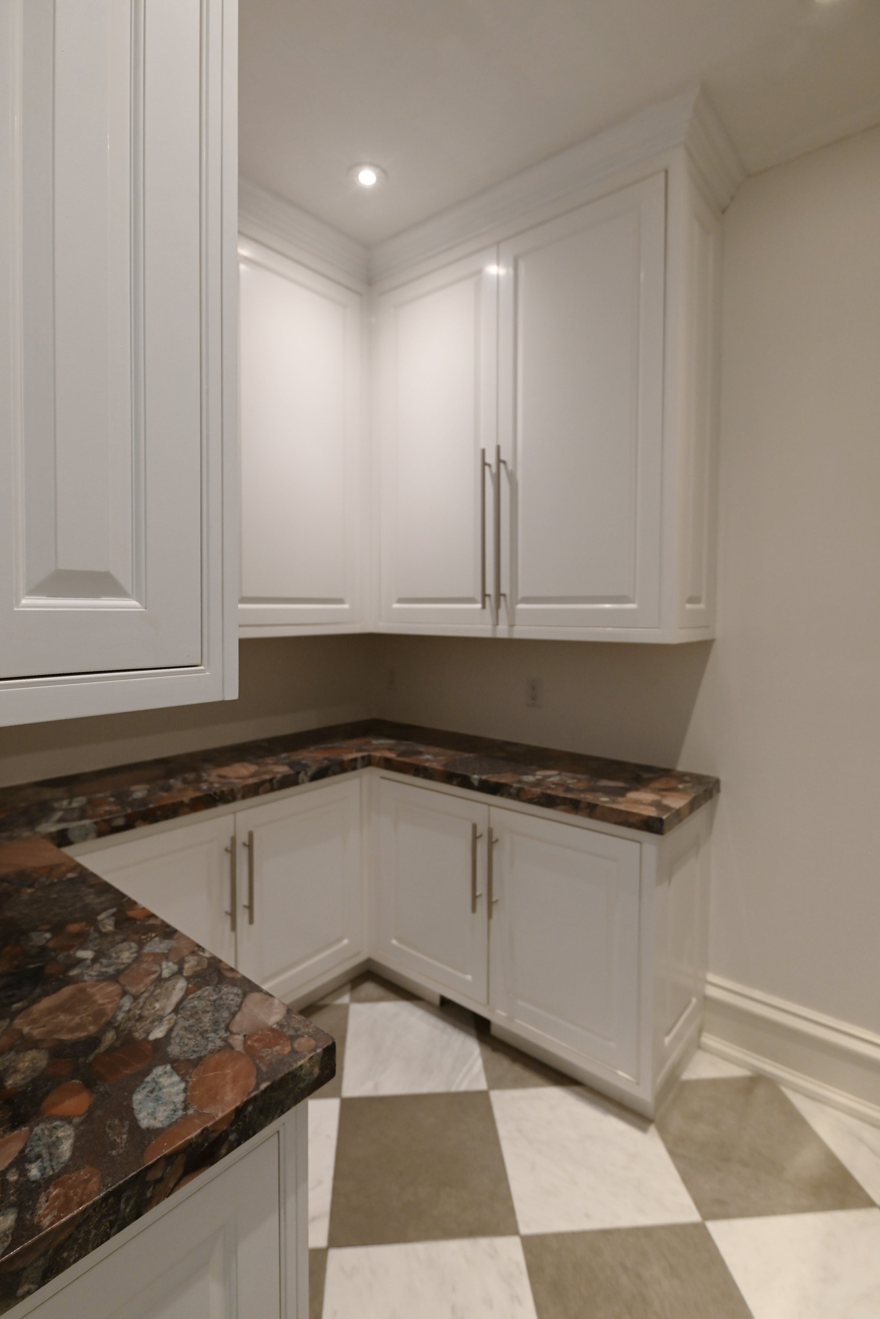 The Dove transitional white custom tall pantry cabinet storage suite with soft white finish