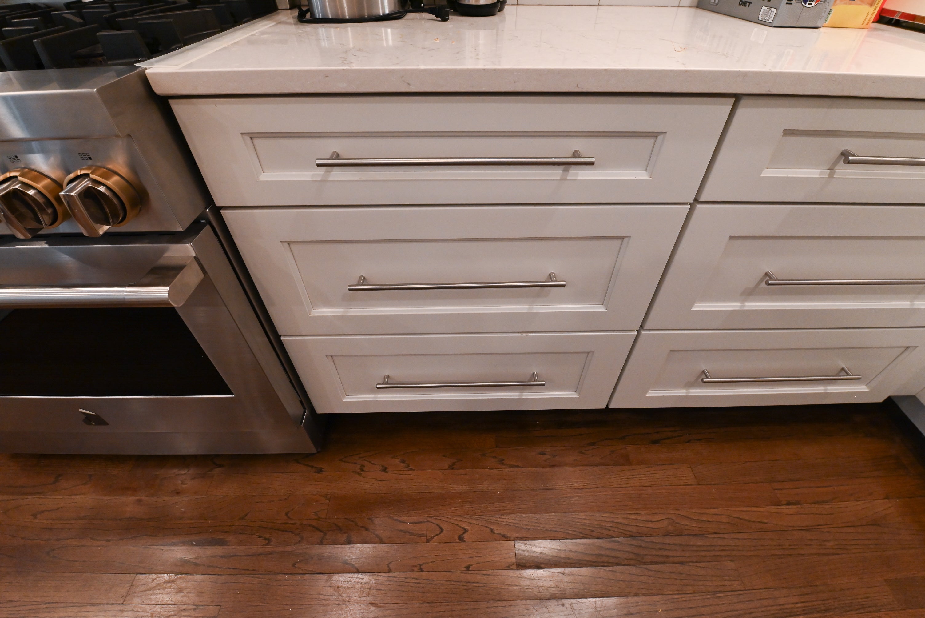 Wellborn Transitional White Kitchen with JennAir Appliances