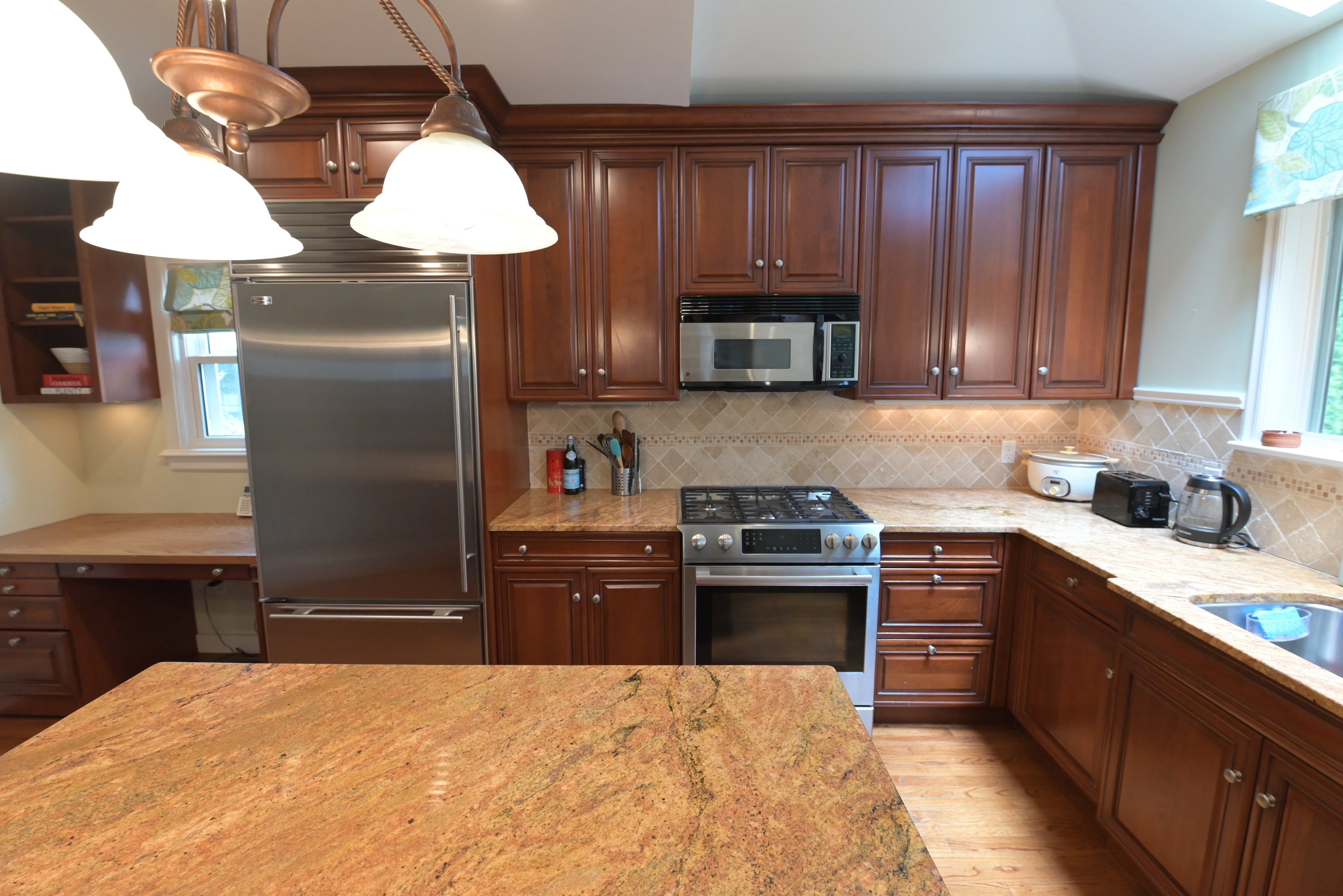 Brookhaven Traditional Wooden Kitchen with Island & Sub-Zero Refrigerator