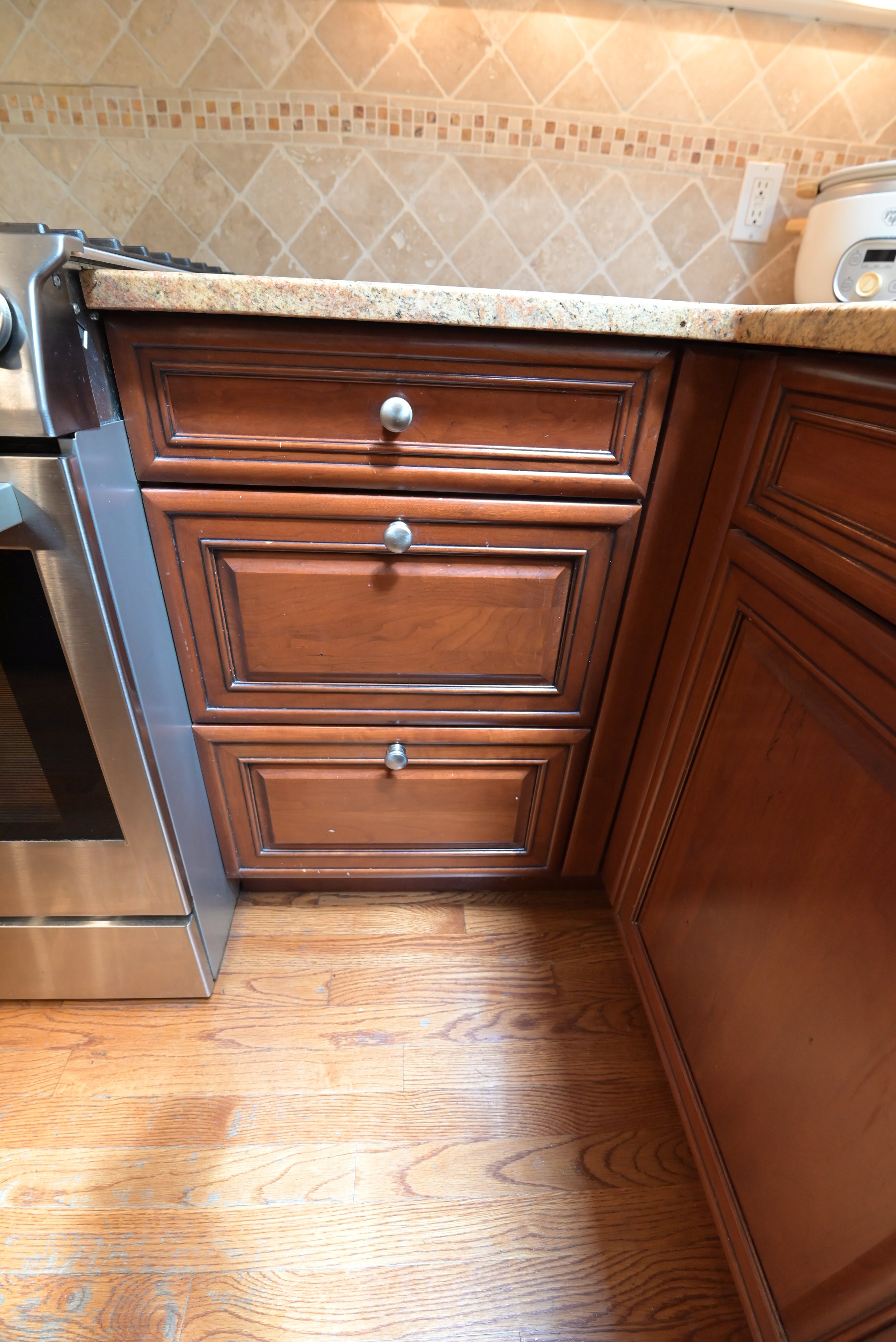 Brookhaven Traditional Wooden Kitchen with Island & Sub-Zero Refrigerator