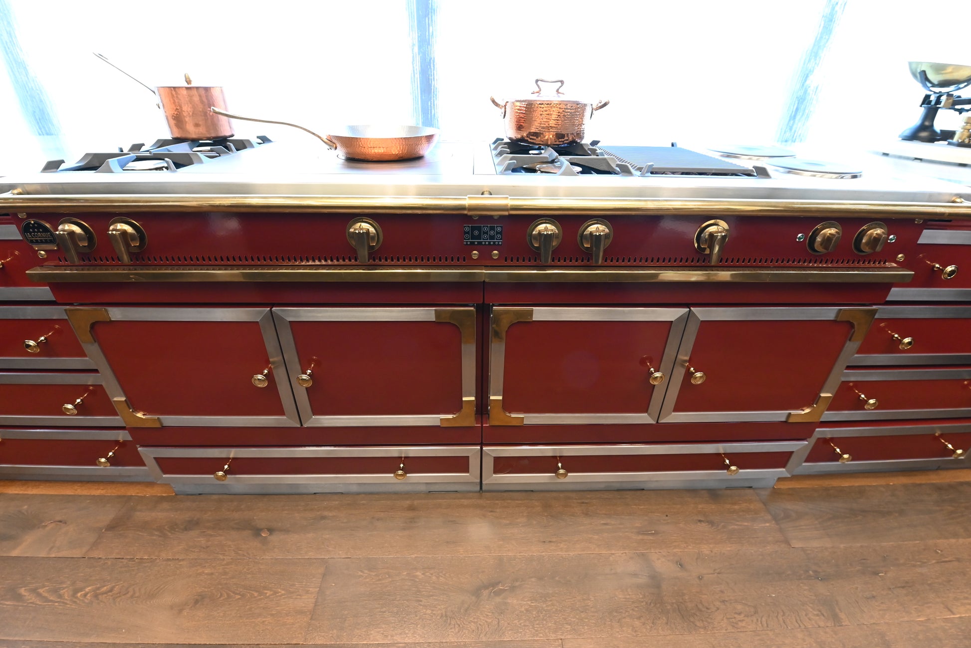 St. Charles Modern Kitchen with La Cornue Chateau Burgundy Cabinets and Glossy Eucalyptus with La Cornue Grand Palais 180 Rangetop and Custom Hood