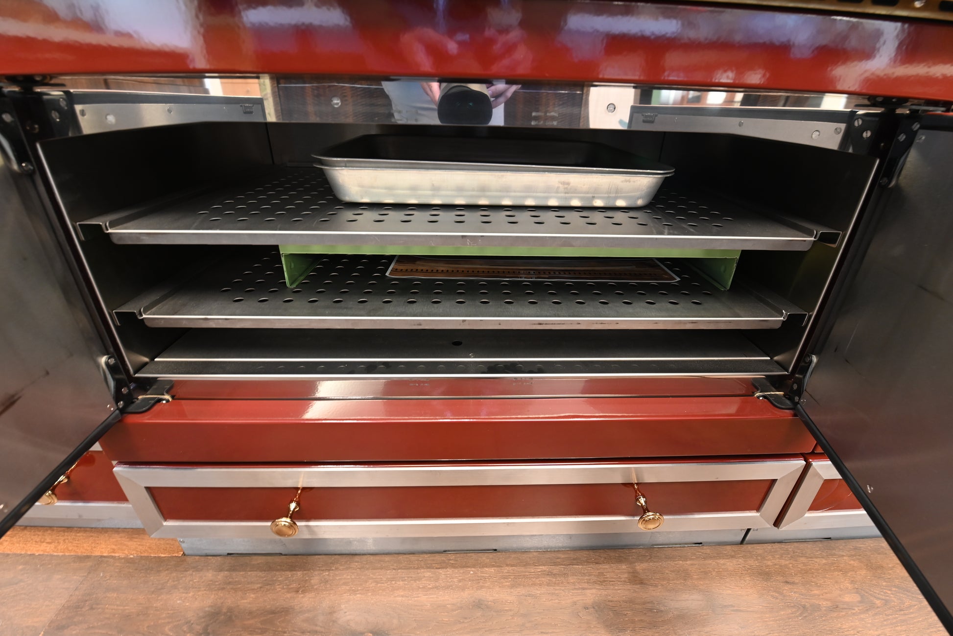 St. Charles Modern Kitchen with La Cornue Chateau Burgundy Cabinets and Glossy Eucalyptus with La Cornue Grand Palais 180 Rangetop and Custom Hood