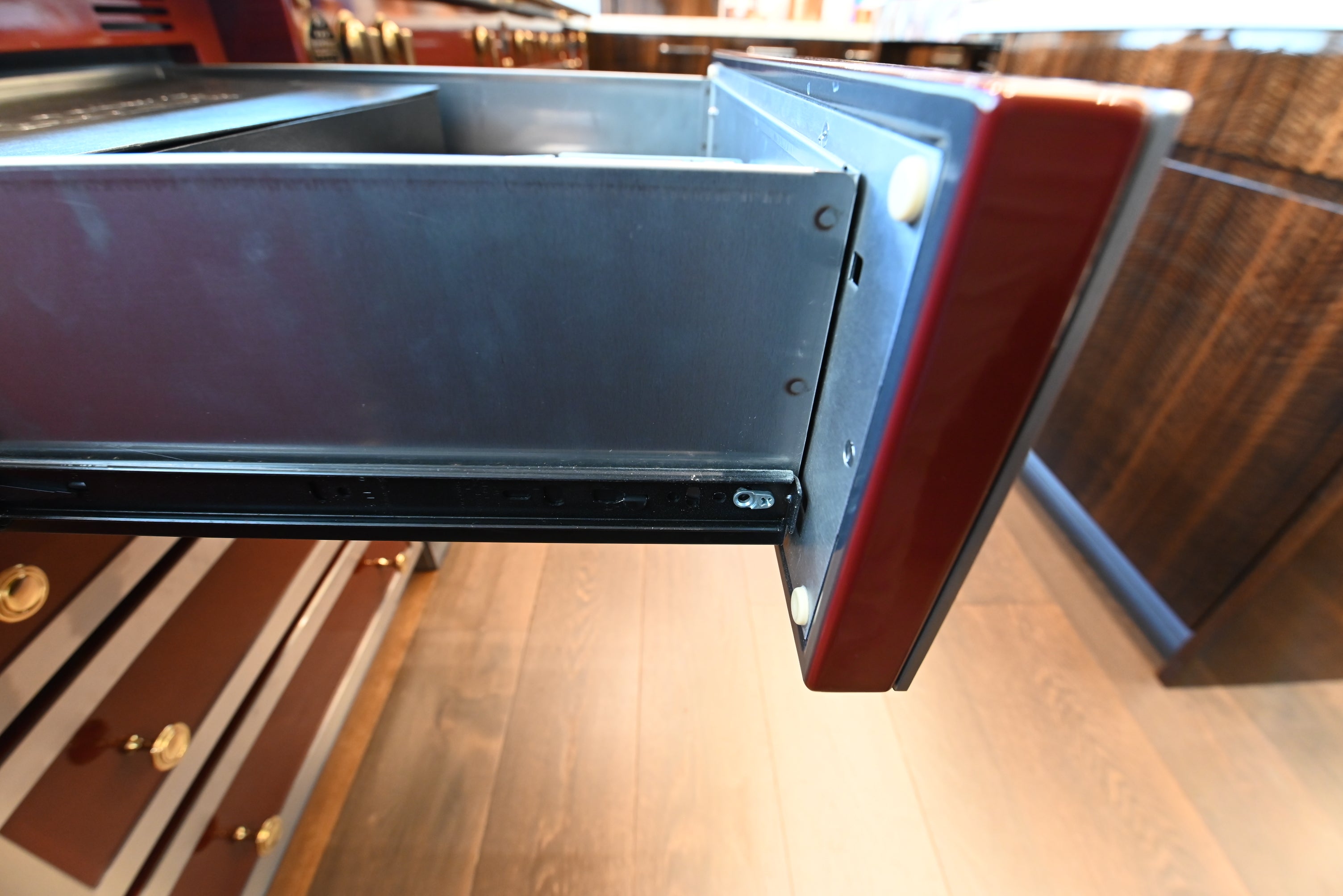 St. Charles Modern Kitchen with La Cornue Chateau Burgundy Cabinets and Glossy Eucalyptus with La Cornue Grand Palais 180 Rangetop and Custom Hood