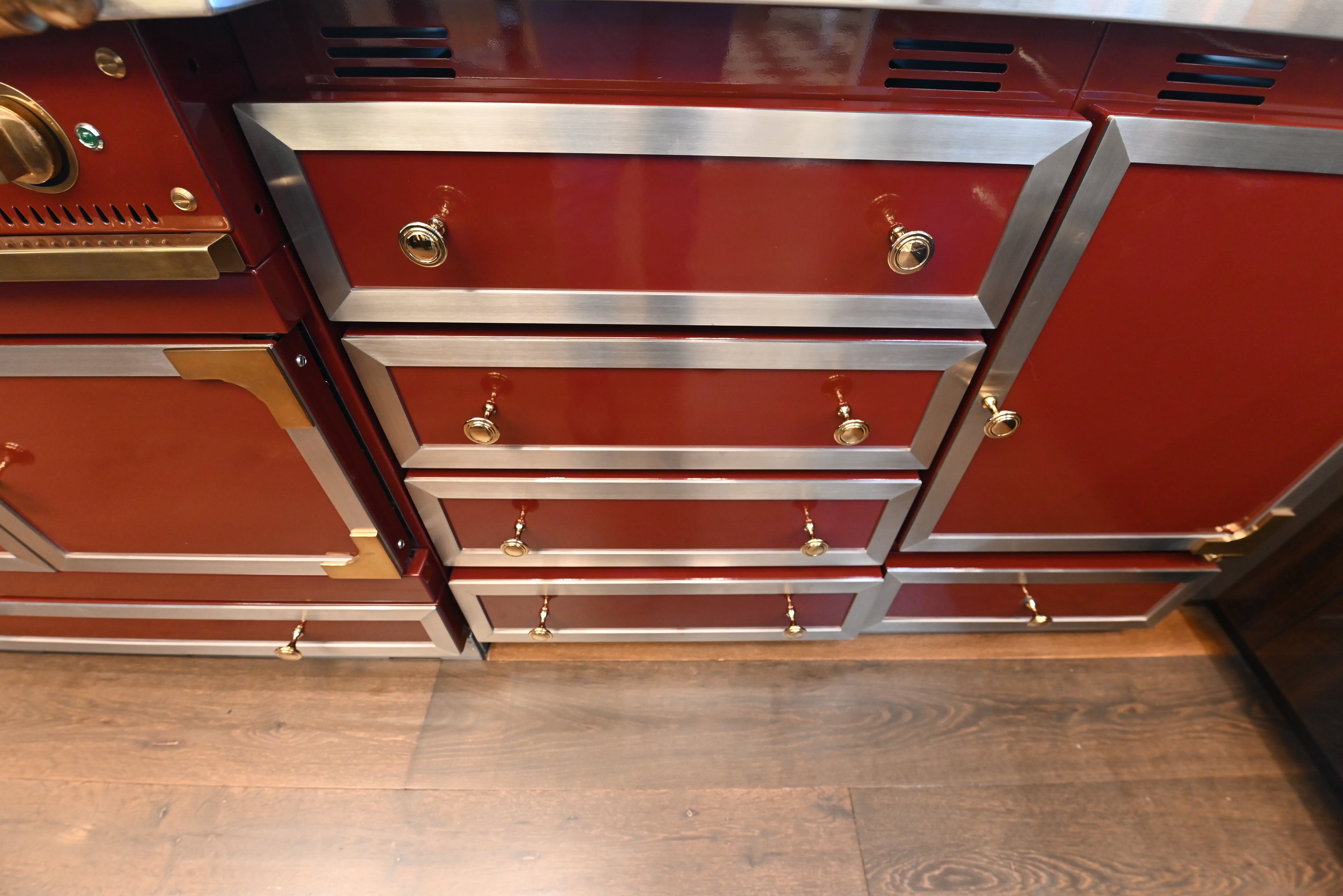 St. Charles Modern Kitchen with La Cornue Chateau Burgundy Cabinets and Glossy Eucalyptus with La Cornue Grand Palais 180 Rangetop and Custom Hood