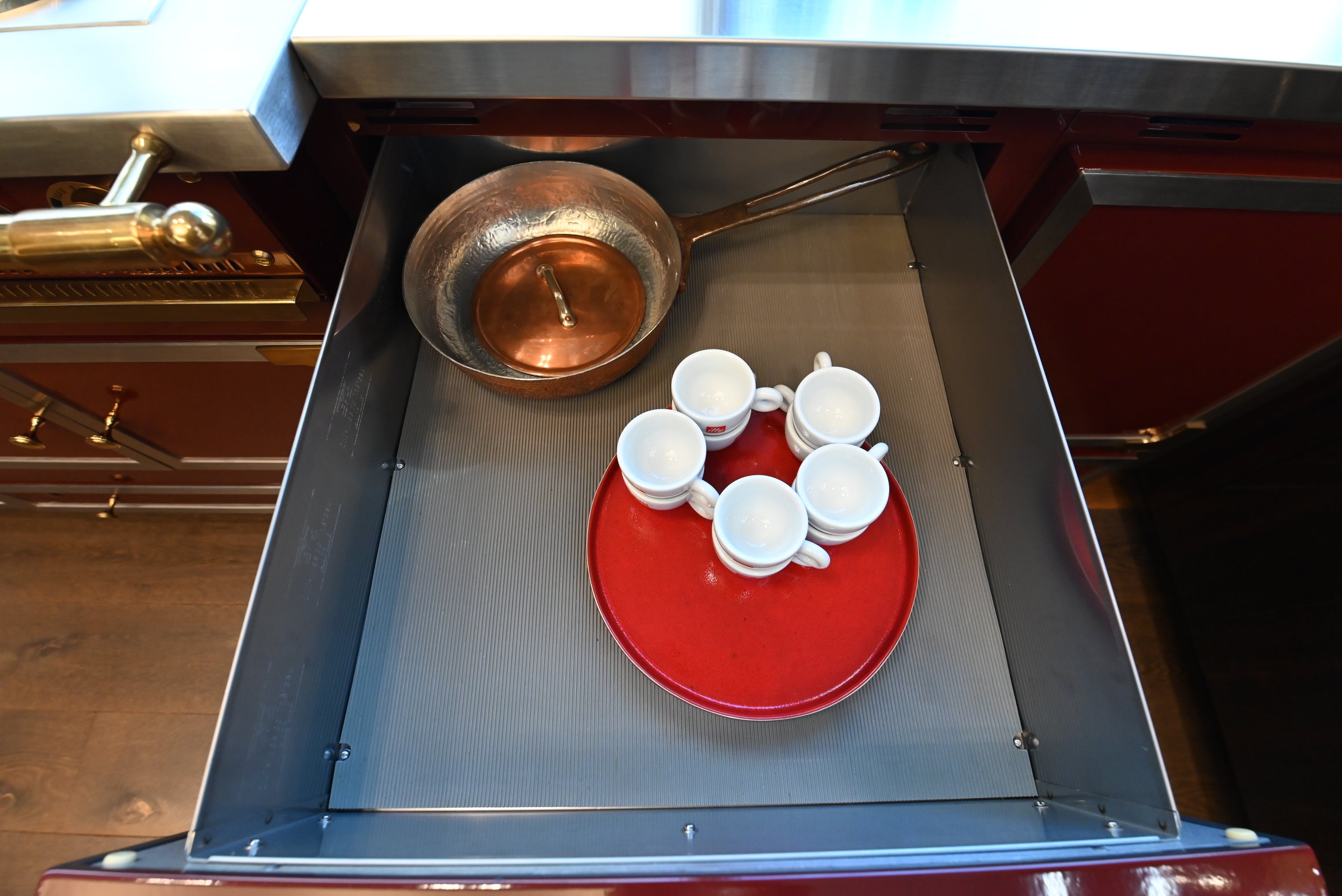 St. Charles Modern Kitchen with La Cornue Chateau Burgundy Cabinets and Glossy Eucalyptus with La Cornue Grand Palais 180 Rangetop and Custom Hood