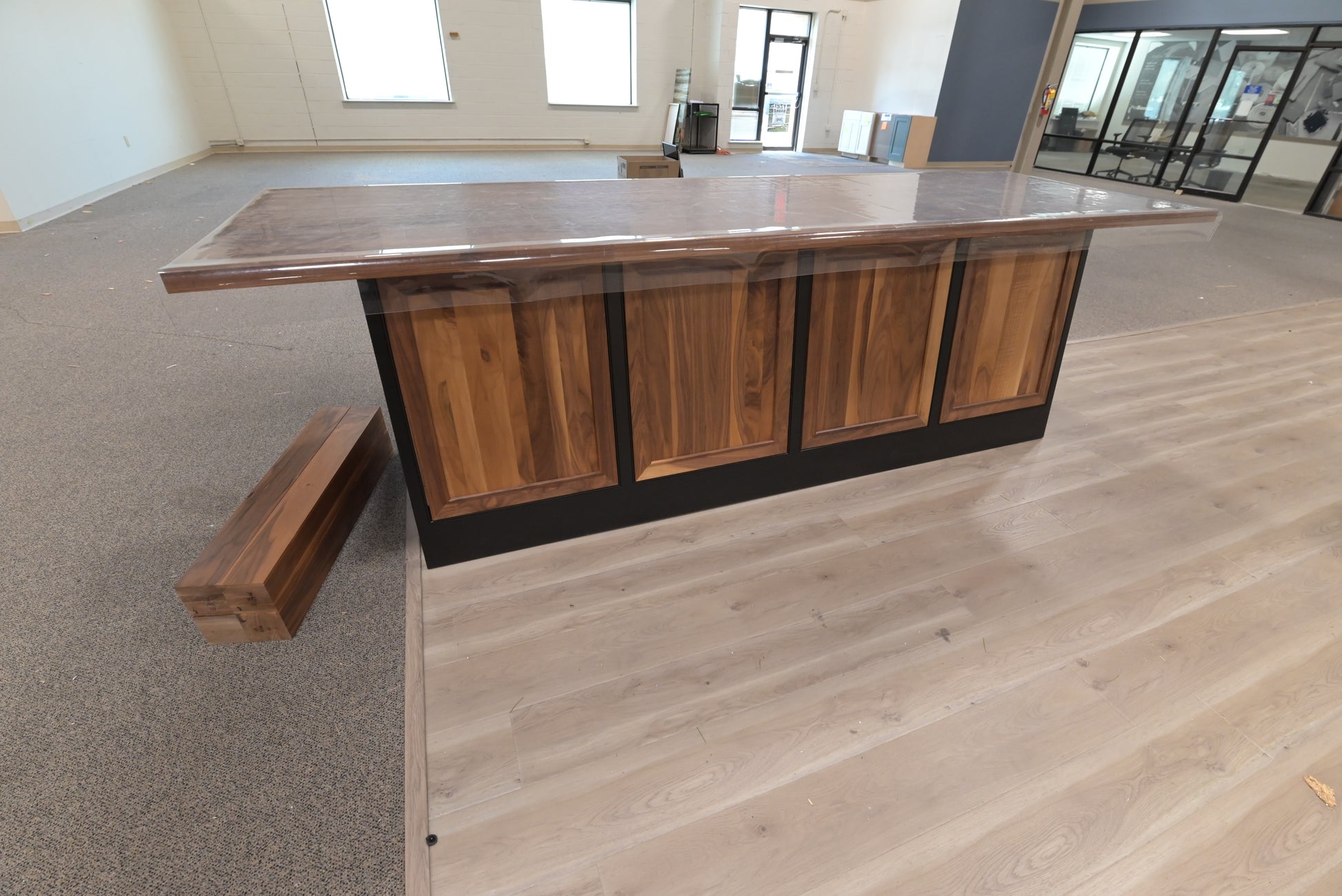 Luxury showroom display two-tone kitchen island with storage drawers