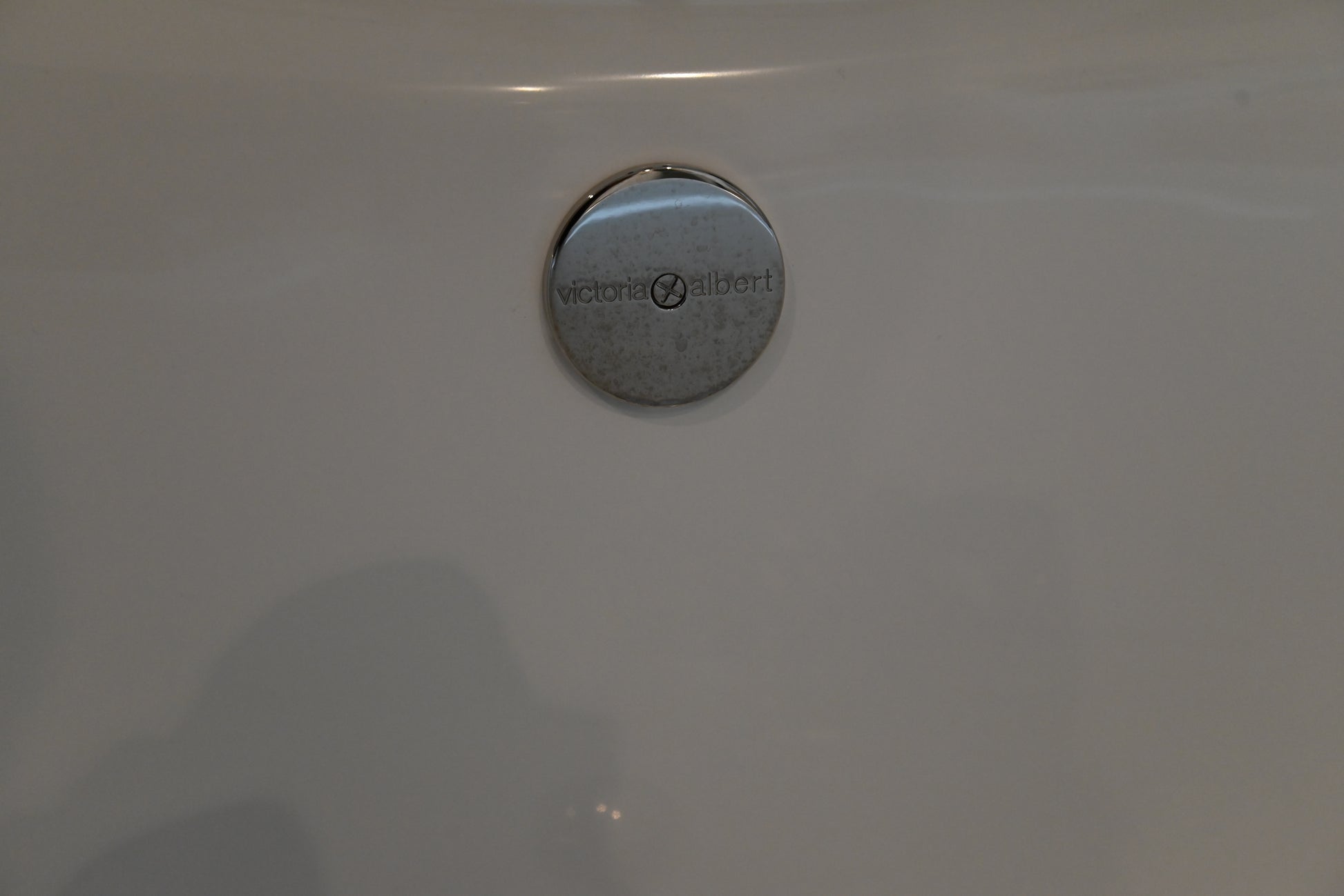 Close up detail of the smooth hand polished Volcanic Limestone surface of the Victoria and Albert 74 inch tub