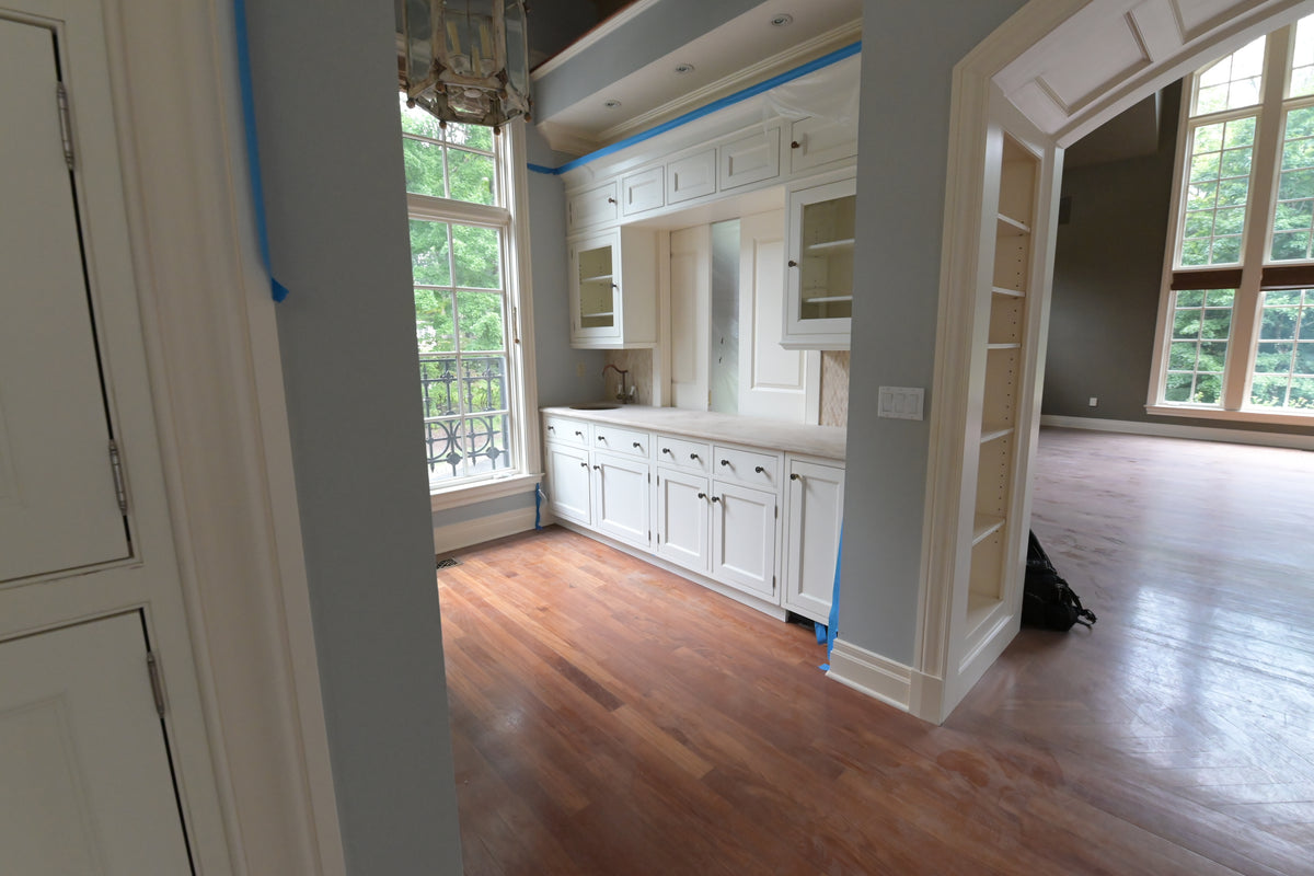 Luxury custom white wet bar suite with solid wood construction