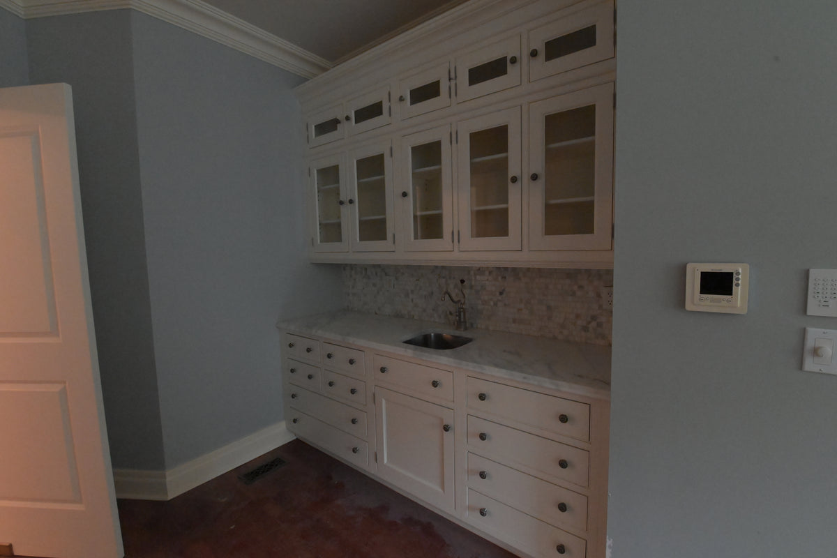 Luxury custom white kitchen pantry suite with solid wood construction
