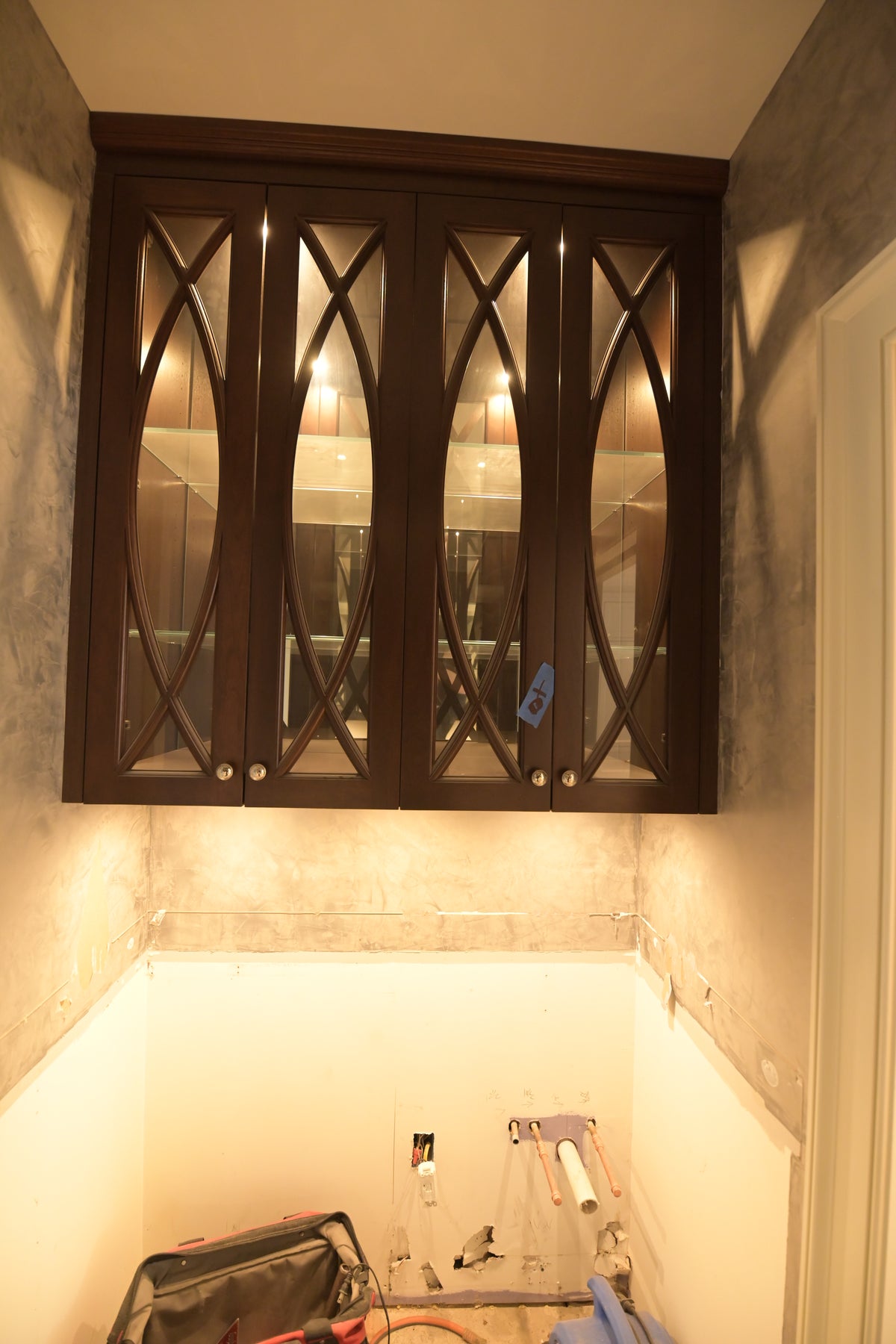 High-end architectural residential butler's pantry cabinetry in natural wood